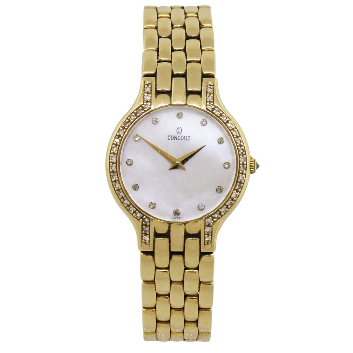Brand: Concord
MPN: 29-62-266
Model: Les Palais
Case Material: 14k yellow gold
Case Diameter: 25mm
Bezel: Round brilliant diamond bezel
Dial: Mother of pearl diamond dial
Bracelet: 14k yellow gold
Crystal: Sapphire crystal
Size: Will fit up to a