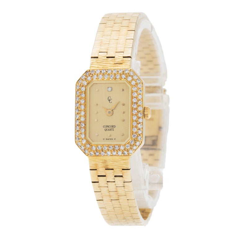 Ladies Concord Classic in 18k yellow gold with diamond bezel. Quartz. Ref 487312. Fine Pre-owned Concord Watch.

Certified preowned Concord Classic 487312 watch is made out of yellow gold with a 18k Clasp buckle. This Concord watch has a 17 x 21 mm