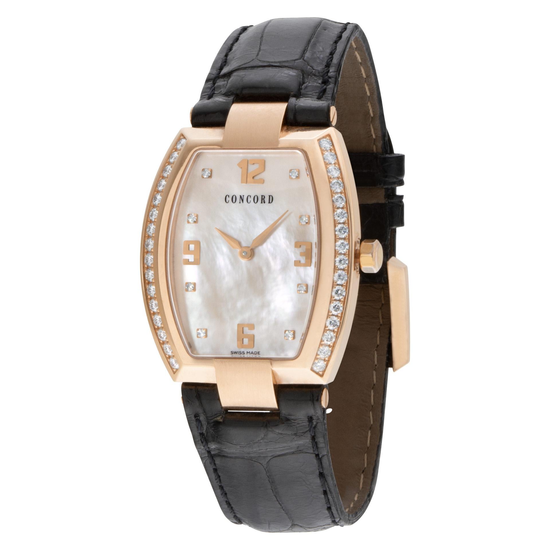 Unisex Concord La Scalla in 18k rose gold with factory original bezel and Mother of Pearl diamond dial on a leather band with 18k rose gold tang buckle. Quartz. Ref 54 G3 1480.0. Fine Pre-owned Concord Watch. Certified preowned Concord La Scala 54