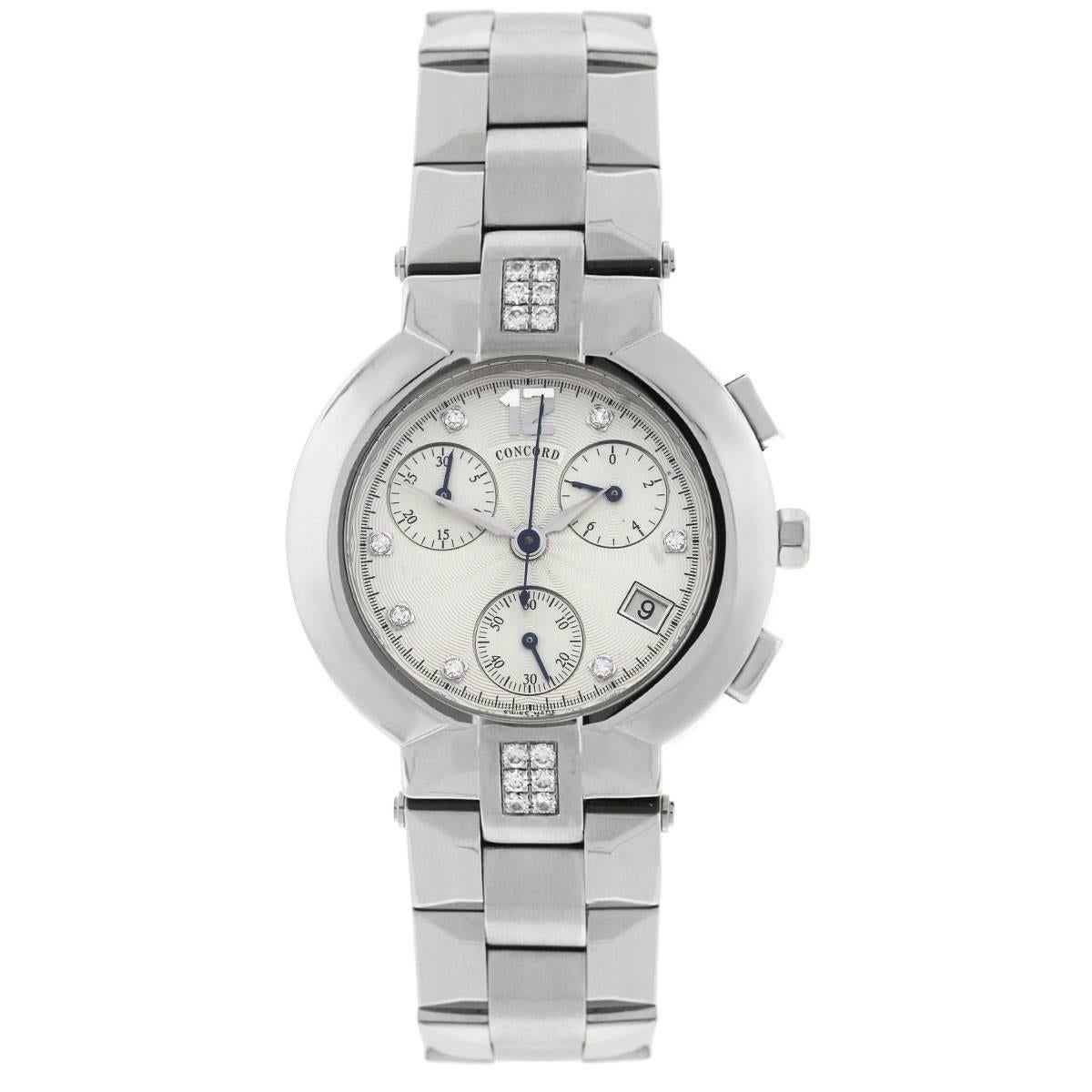Brand: Concord
Model: La Scala
Case Material: Stainless steel
Case Diameter: 40mm
Crystal: Sapphire Crystal
Bezel: Stainless steel diamond bezel
Dial: Silver chronograph diamond dial
Bracelet: Stainless steel
Size: Will fit a 6.50″ wrist
Clasp: