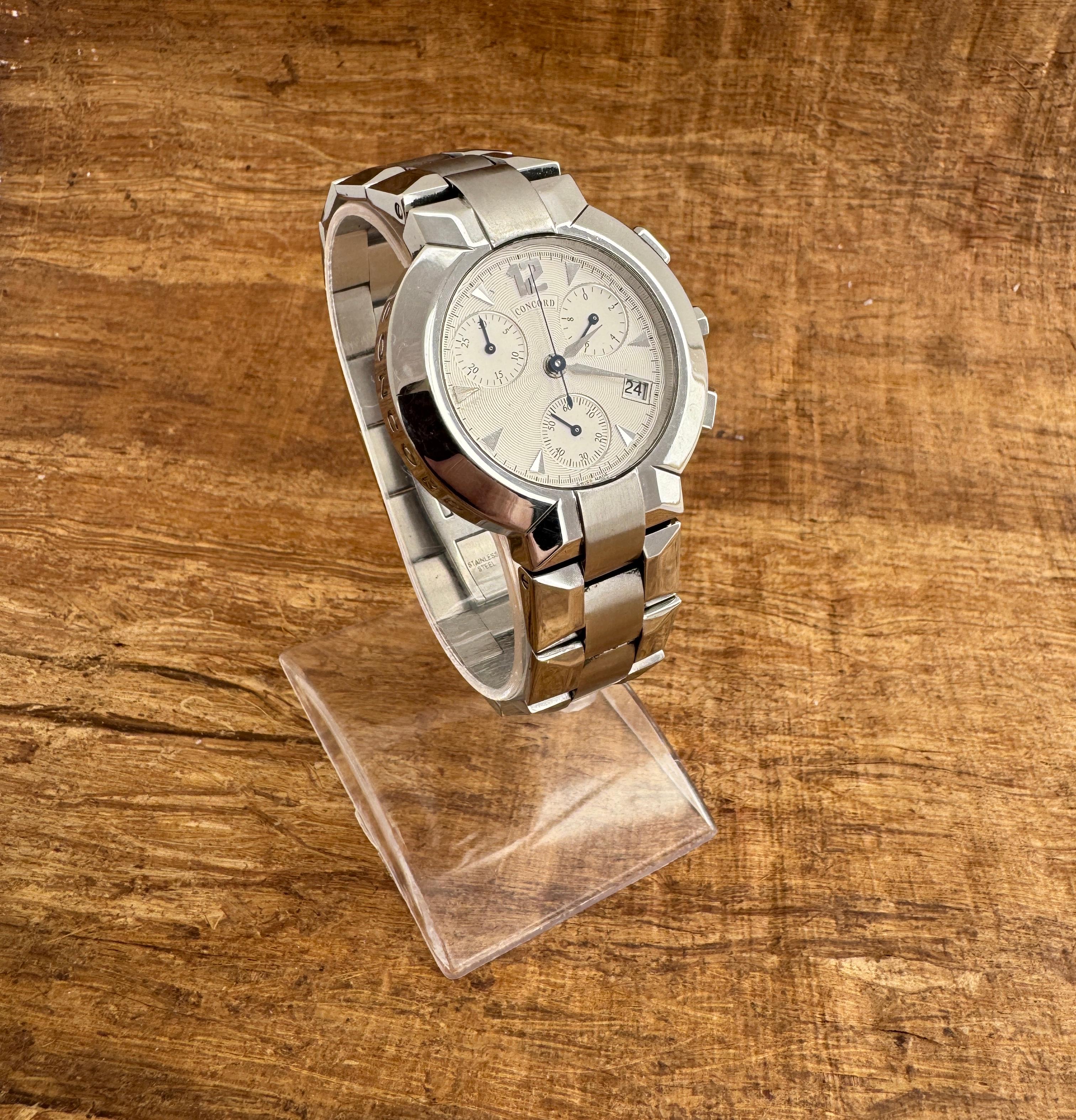  Description
Brand: CONCORD

Model: La Scala

Country Of Manufacture: Switzerland

Movement: Quartz

Case Material: Stainless steel

Measurements : Case width: 38 mm. (without crown)

Band Type : Stainless steel

Band Condition : In Good condition,