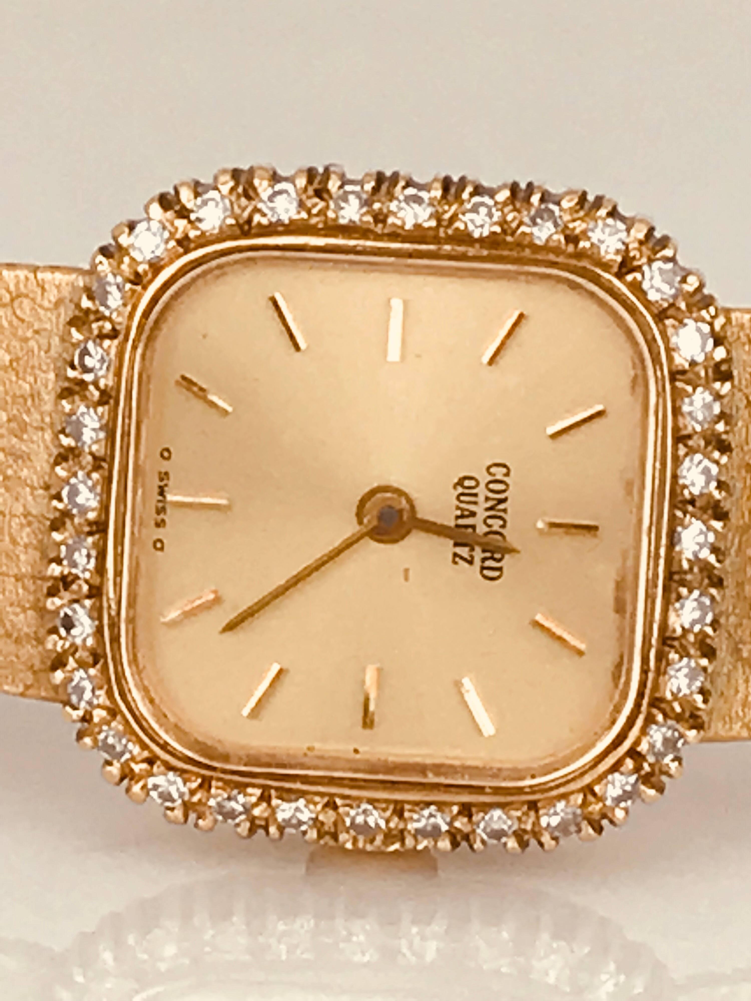 Ladies Diamond mesh Concord watch.  The movement is quartz.
The metal is 14 karat. Retro style, Circa 1985

The diamond bezel consists of  (23) round single cut stones weighing approximately 1.6 millimeters in diameter.  Total weight of the diamonds