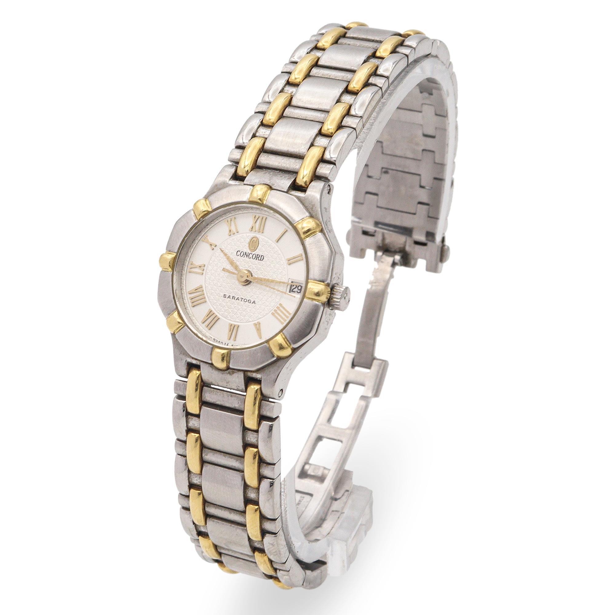 This is a Concord Saratoga women’s wristwatch, blending timeless elegance with everyday functionality. The two-tone design features a stainless steel case and bracelet accented with gold-plated links and bezel markers, offering a refined and