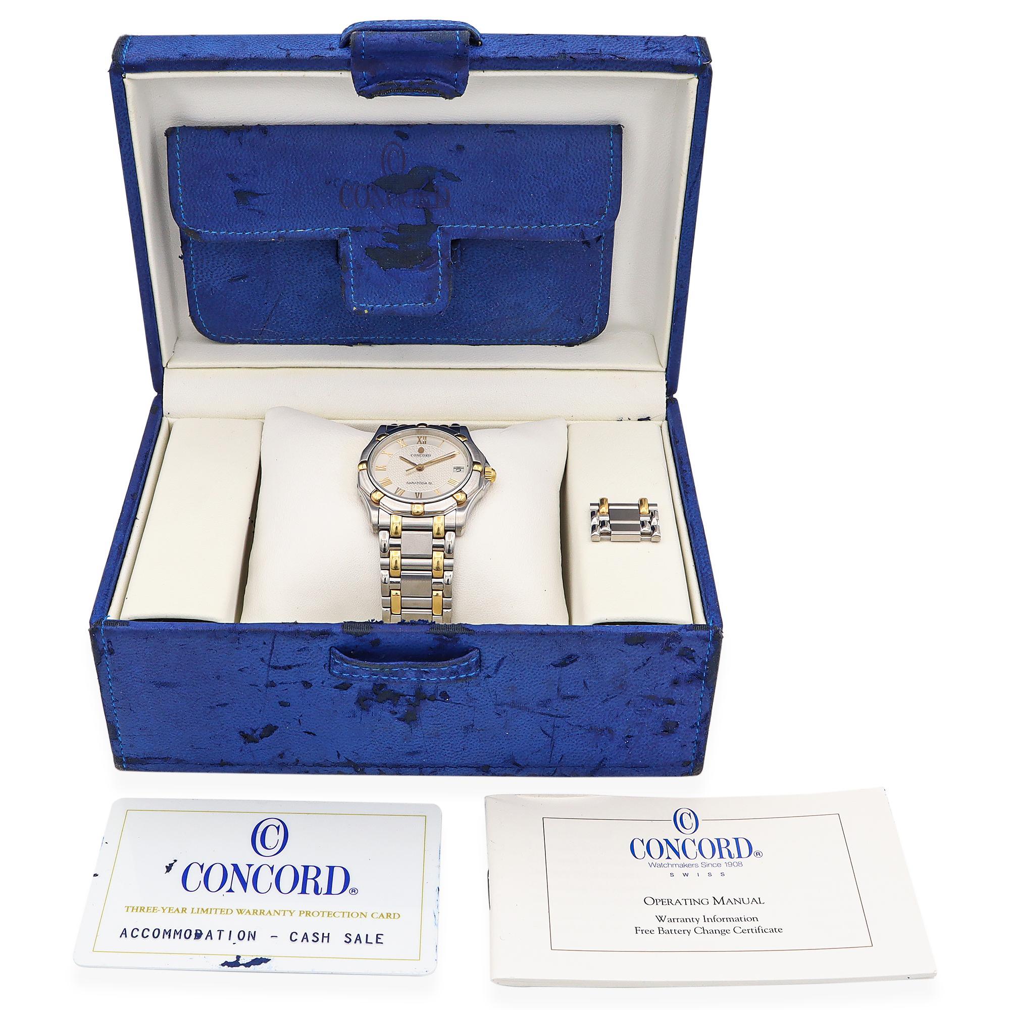 This Concord Saratoga SL watch blends classic refinement with modern durability. It features a stainless steel case and bracelet, elegantly accented with gold-tone details, creating a sophisticated two-tone design. The silver-tone dial is adorned