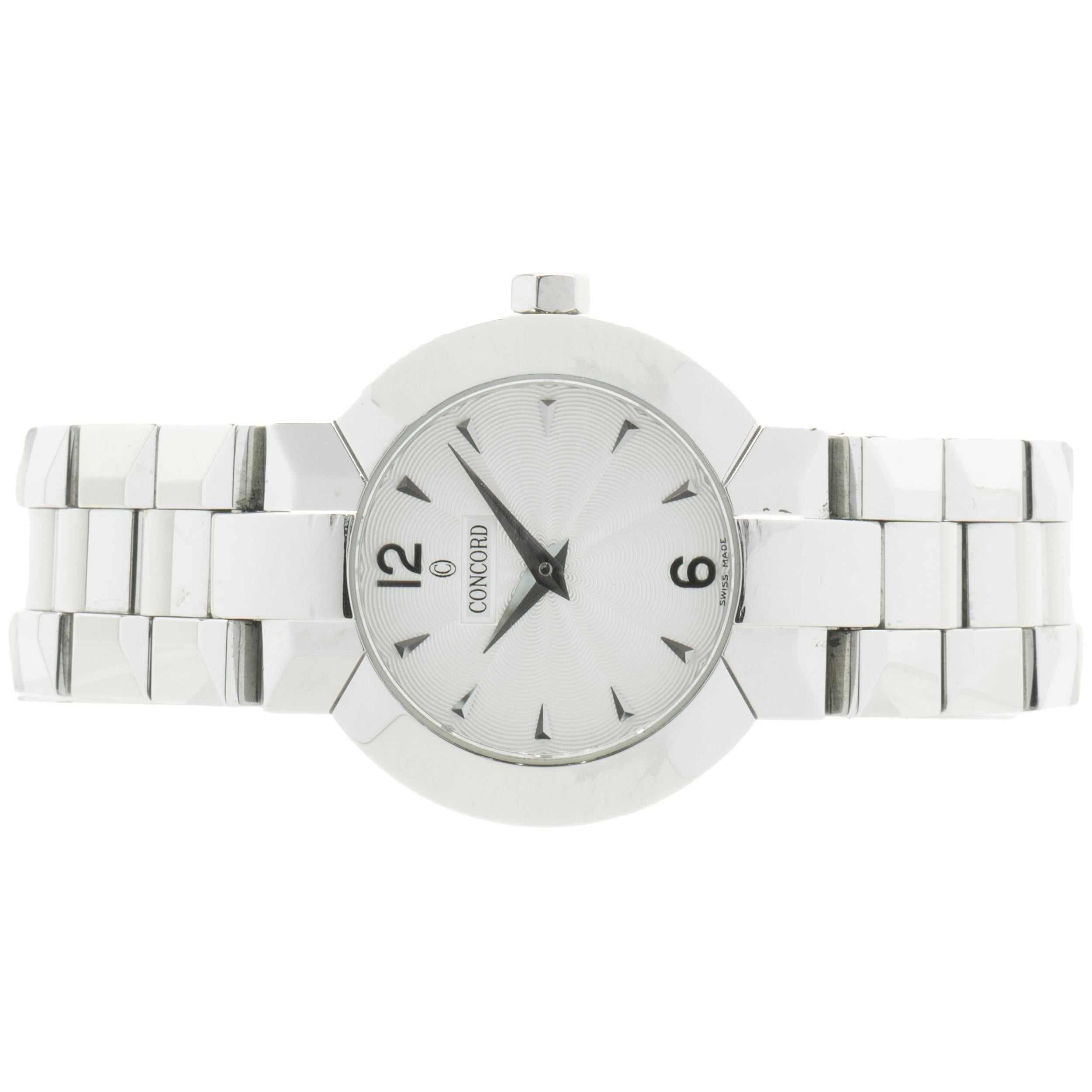 Movement: quartz
Function: hours, minutes
Case: 26mm round case, smooth bezel, sapphire crystal, pull/push crown, water resistant
Dial: silver stick
Band: Concord stainless steel bracelet, integrated clasp
Serial#: 1331XXX
Reference #: