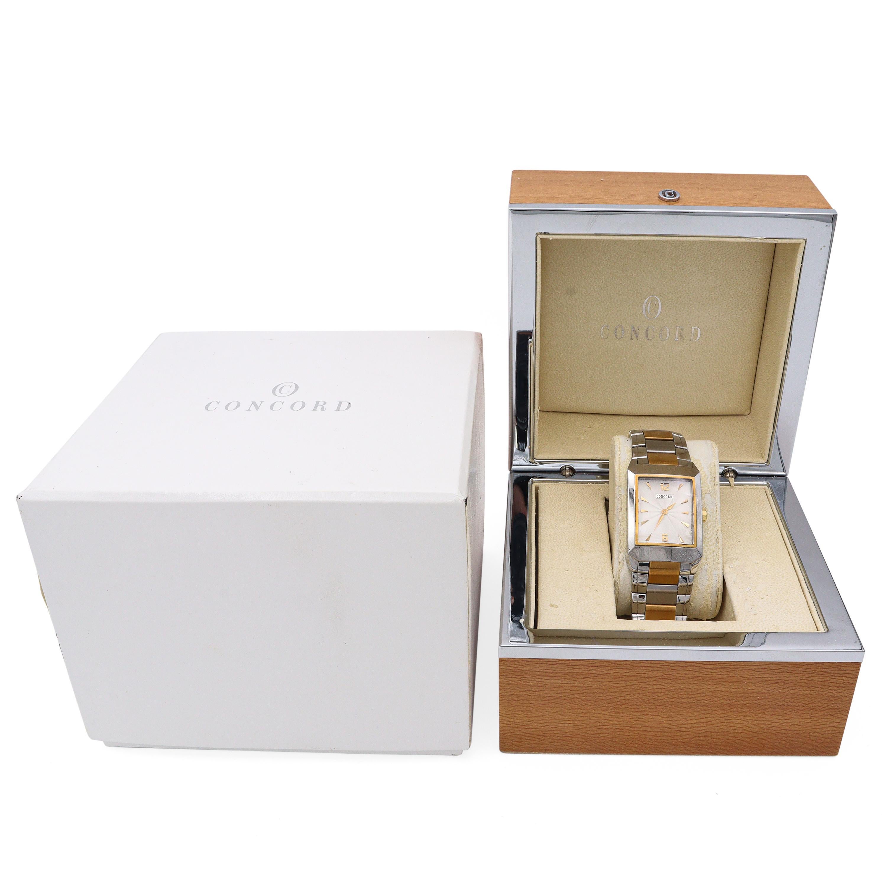 Refined and contemporary, this Concord Men's Quartz Watch offers a sleek blend of form and function. The rectangular stainless steel case is paired with a matching two-tone bracelet featuring bold gold-tone center links, creating a sophisticated