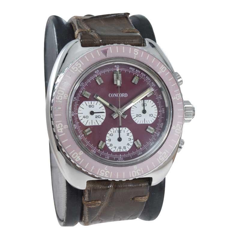 FACTORY / HOUSE: Concord Watch Company
STYLE / REFERENCE: Chronograph / Tonneau Shape
METAL / MATERIAL: Stainless Steel 
DIMENSIONS: Length 45mm X Diameter 43mm
CIRCA: 1970's
MOVEMENT / CALIBER: Manual Winding / 17 Jewels / Three Register
DIAL /