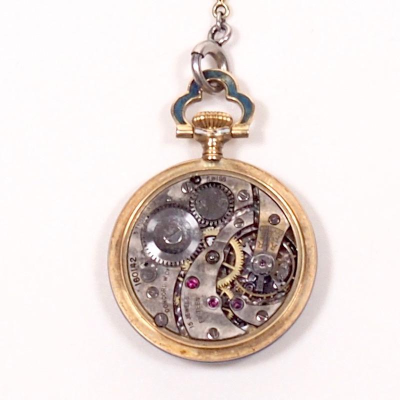 Edwardian 14k gold and enamel pendant watch, Concord Watch Co. 1915 in working order
Guilloche enamel case with platinum and diamond mount enclosing a 15-jewel movement, gold single sunk dial Arabic numerals, blued enamel hands, subdial for seconds
