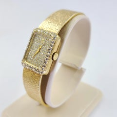 Montre pour femmes Concord en or jaune pavé de diamants