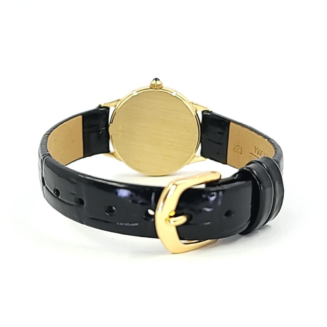Pre-Owned 18 Karat Yellow Gold Concord Ladies Quartz Watch Featuring A 24mm Case. New Black Leather Strap. Battery Replaced August 2022; Includes 1 Year Timekeeping Warranty From Date of Purchase.