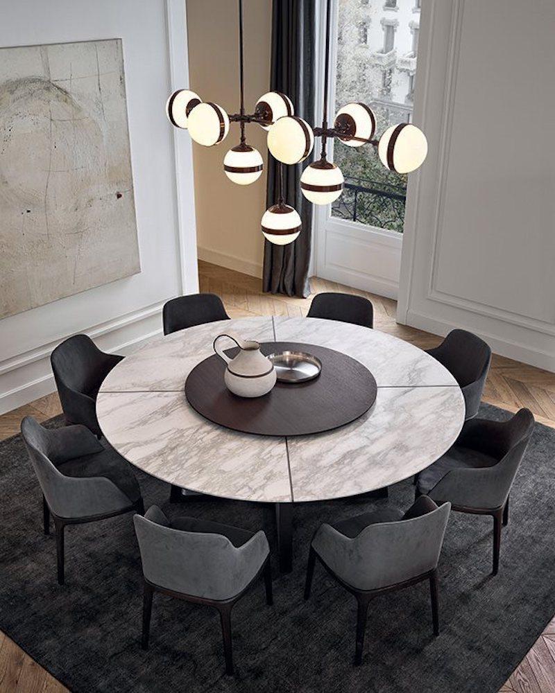 The Concorde is a round dining table with optional spinning tray and available in two sizes with four wooden base and six marble top options that can be combined to create the optimum look for your environment.

Wooden base options: 
Walnut,