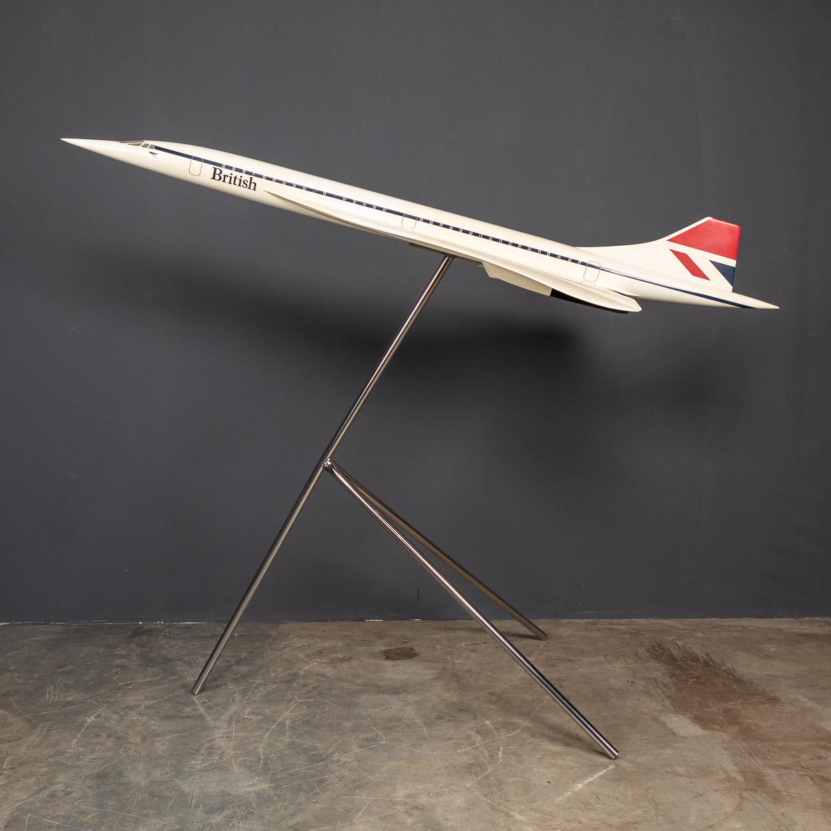 A splendid vintage fiberglass and plastic composite model of a Concorde in full British Airways livery mounted on a tripod stand by Space Models, circa 1990. This scaled down aircraft model was presented to one of BA's top travel agents to use for