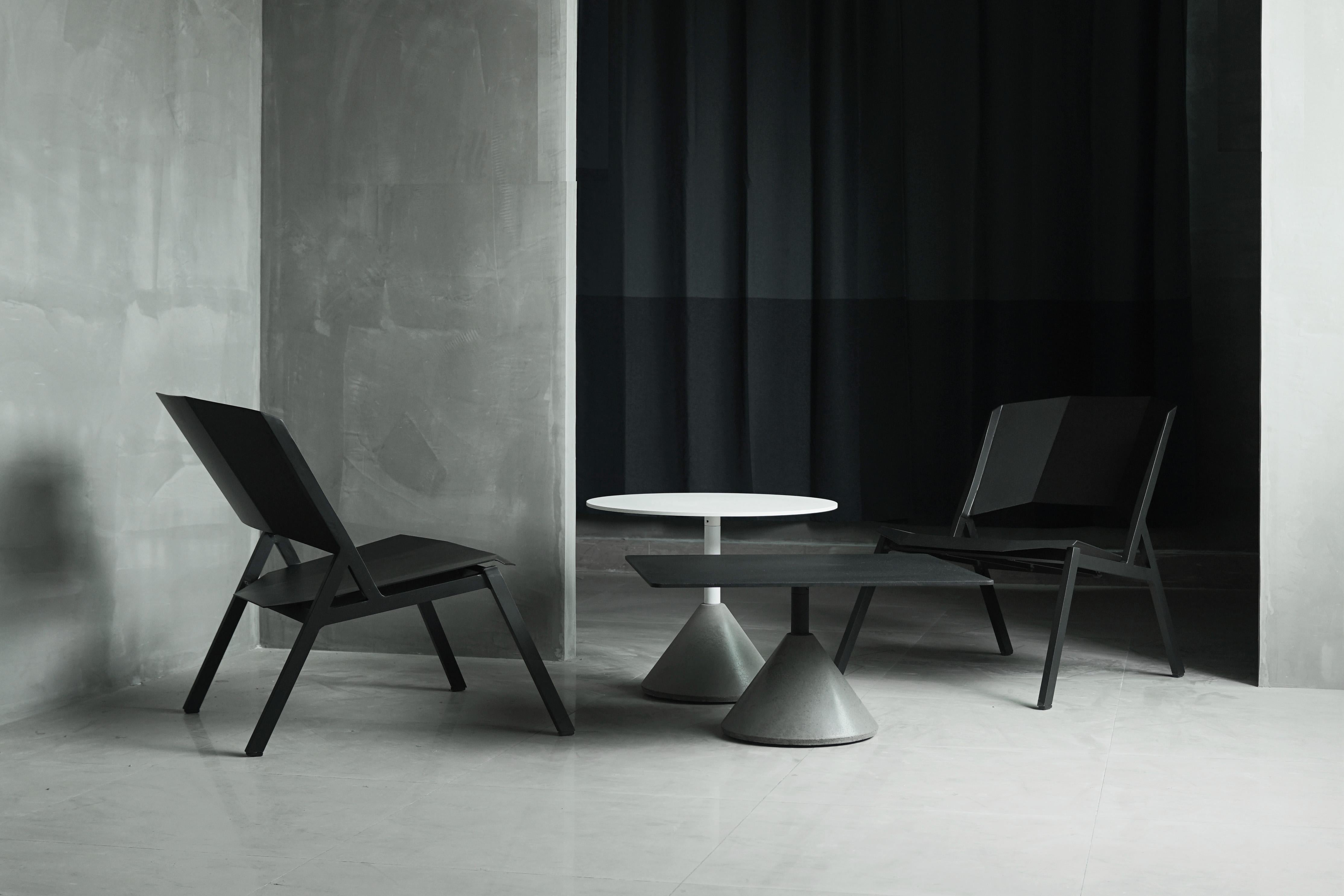 Material: Concrete, aluminum, demolition leftover concrete
Size: 600 x 700 x H350 mm
Weight: 28 kg
Color: Cement grey
Tabletop color: Black

About the Artist/ Designer:
Bentu's furniture derives its uniqueness from the simplicity of its forms