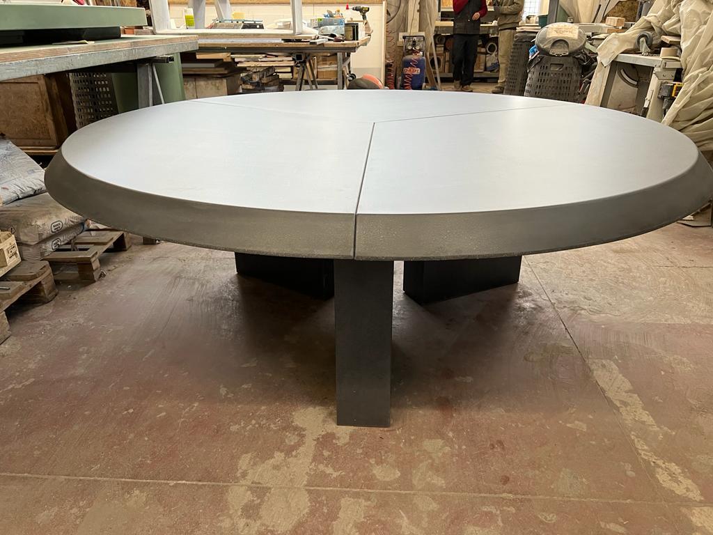 black concrete round dining table