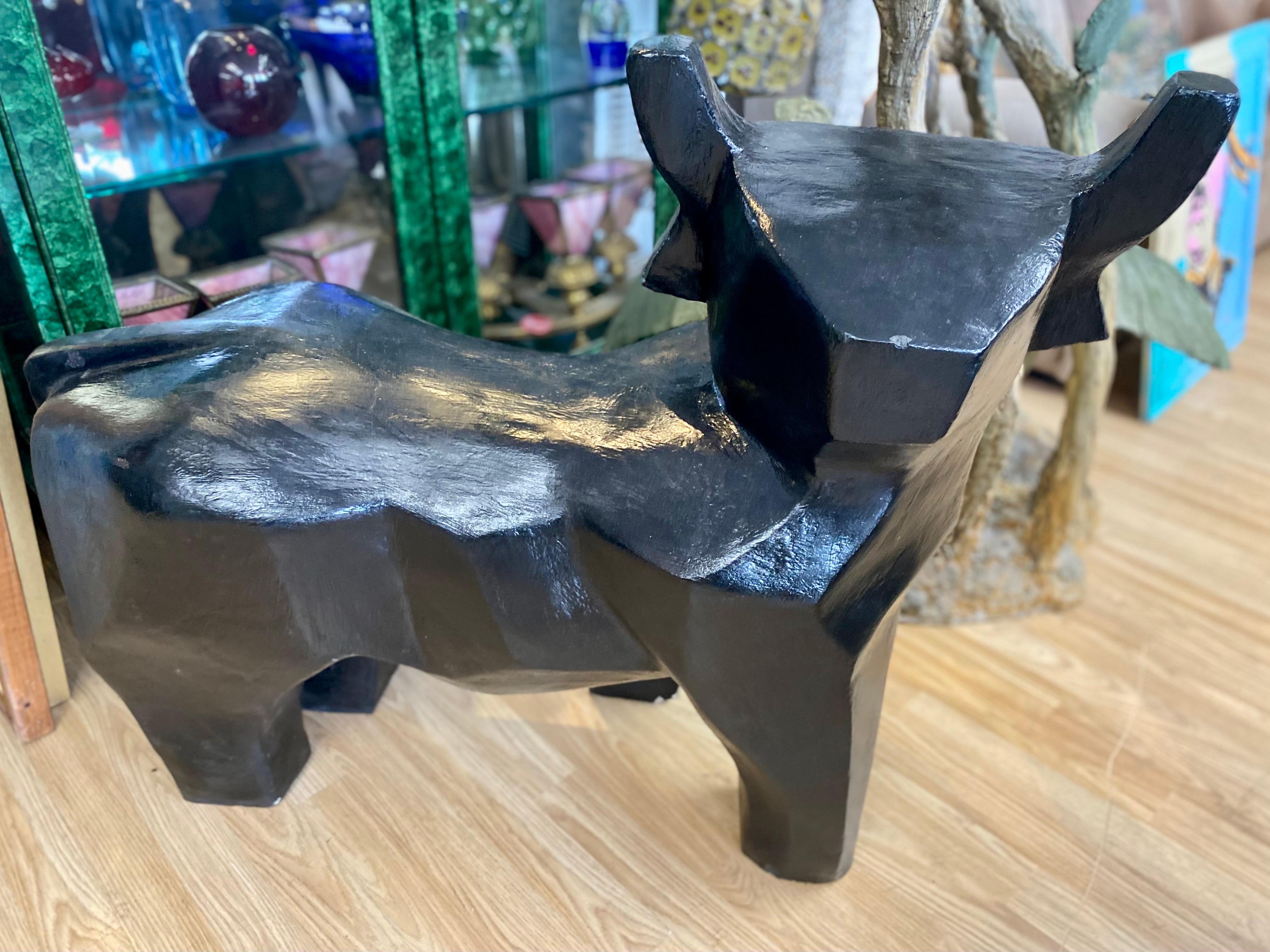 Vintage concrete cubist bull sculpture, France, circa 1980s. The bull sculpture is made out of reinforced solid concrete and painted black. Very heavy and in solid condition with a chip on its bottom left leg as shown in photo. 

37