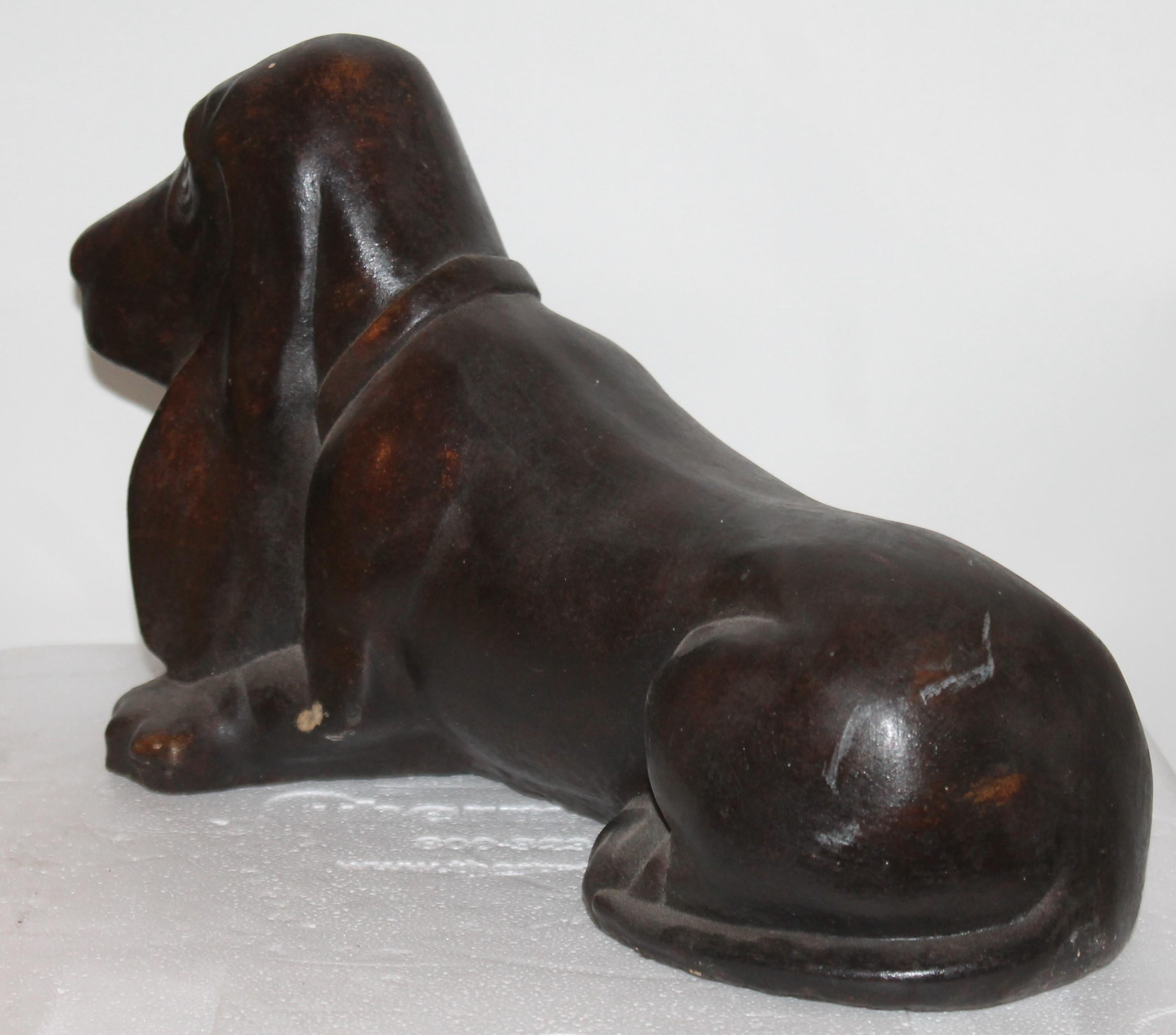 concrete dachshund statue