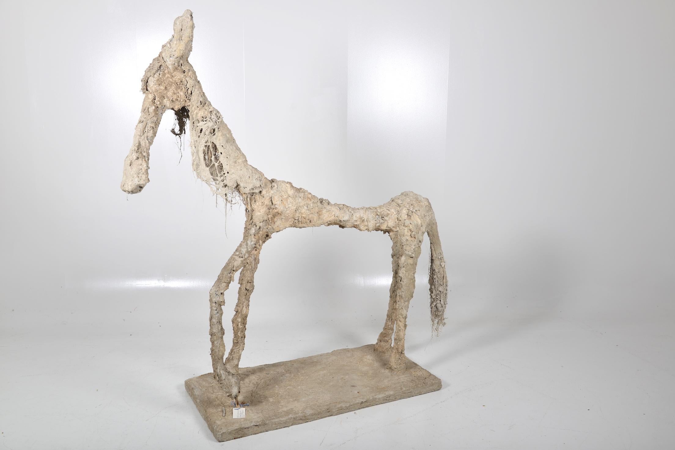 This outsider art concrete donkey was made on a steel frame. Giacometti with a twist. We bought it from a Biarritz dealer, and it is believed to be made by local artist, called R Dubos in the 1970s. He was inspired by Giacometti’s work and decided