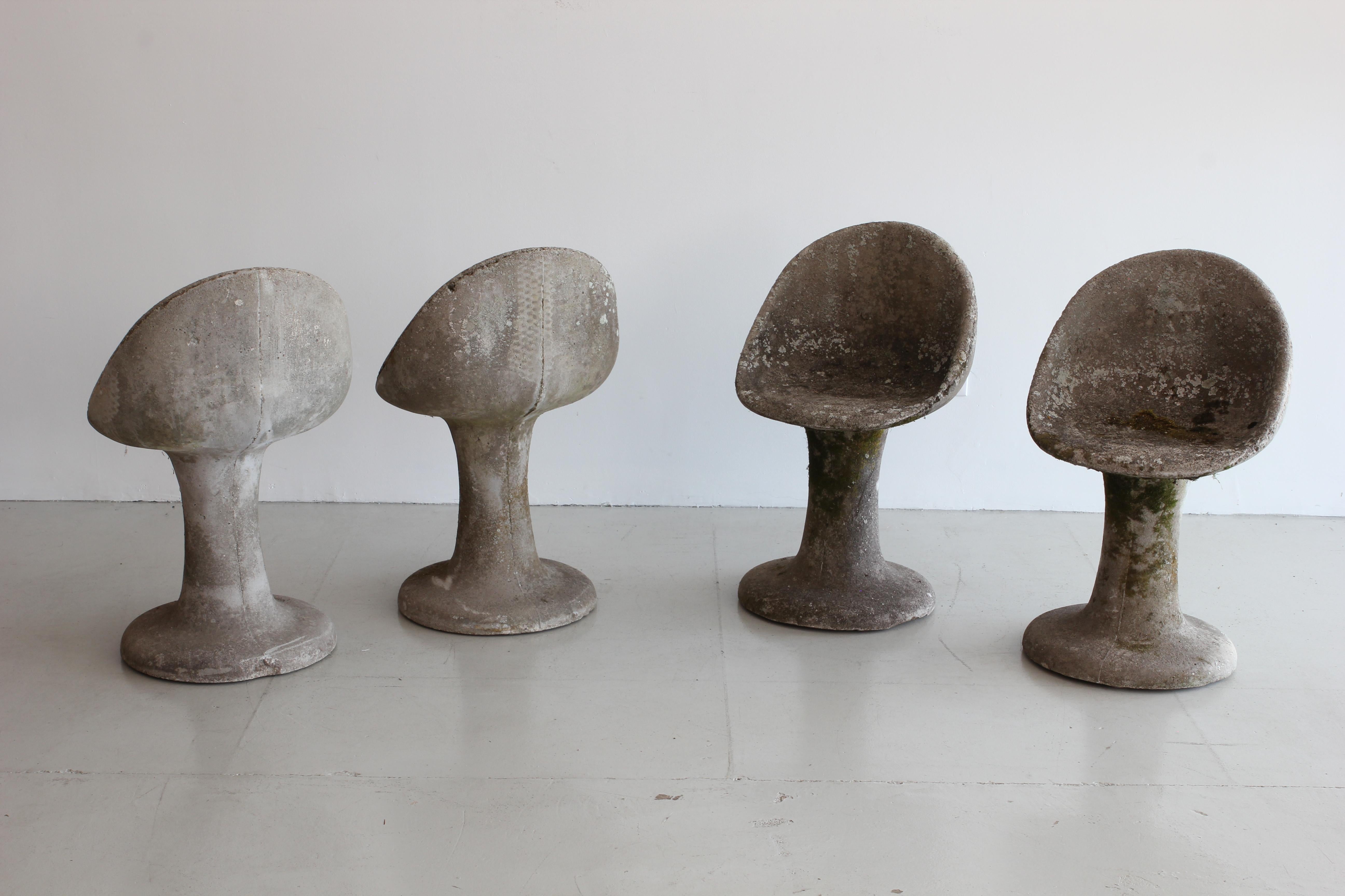 Incredible one-of-a-kind outdoor concrete chairs with rich patina and moss. 

Sold as pairs. Two pairs available.
