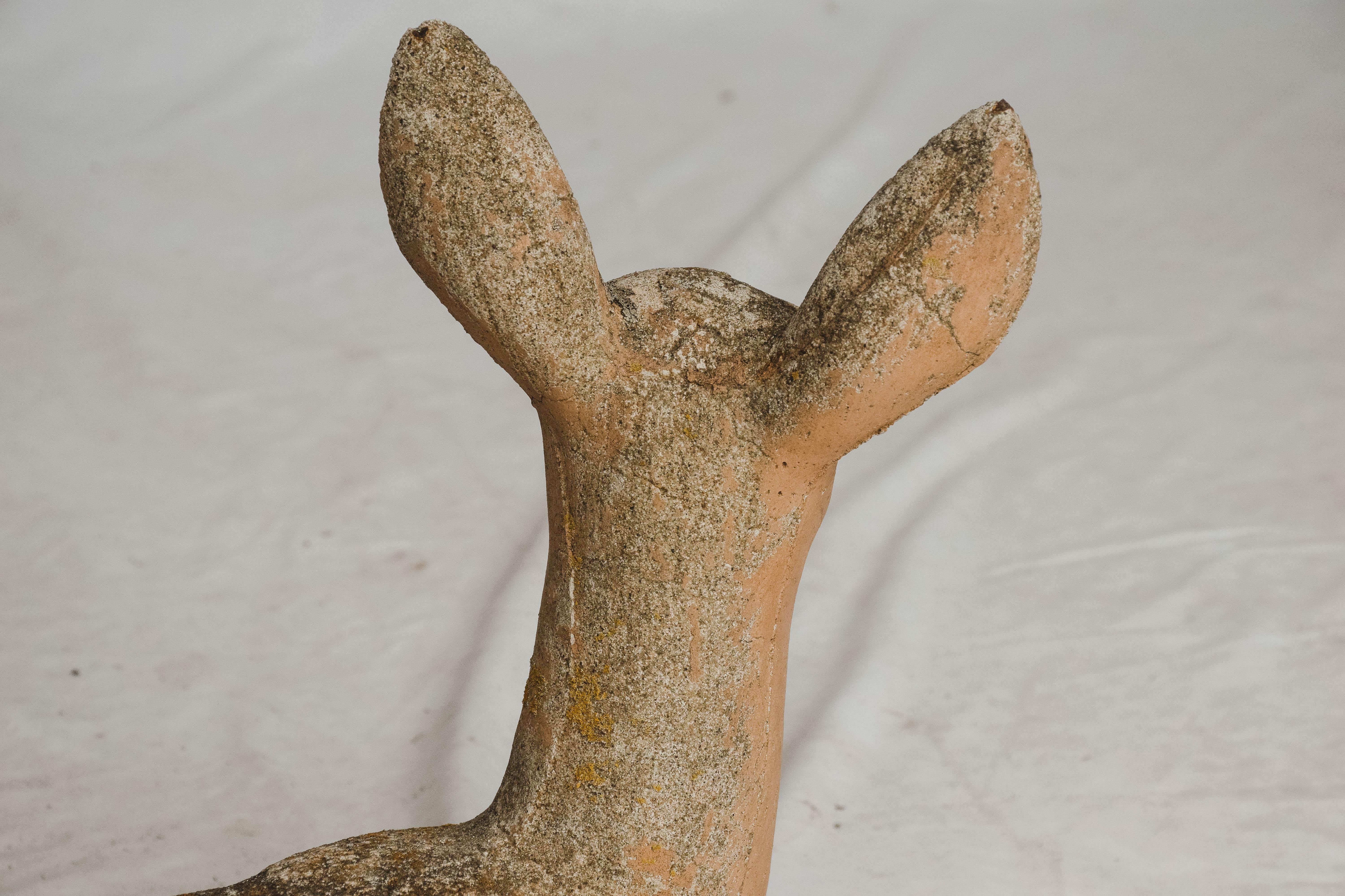 Found in Southern France, this charming vintage concrete garden element in the form of a deer has wonderful aged patina. Would be great both outdoors in your garden, on your patio or would be fabulous sitting on a console or buffet indoors.
