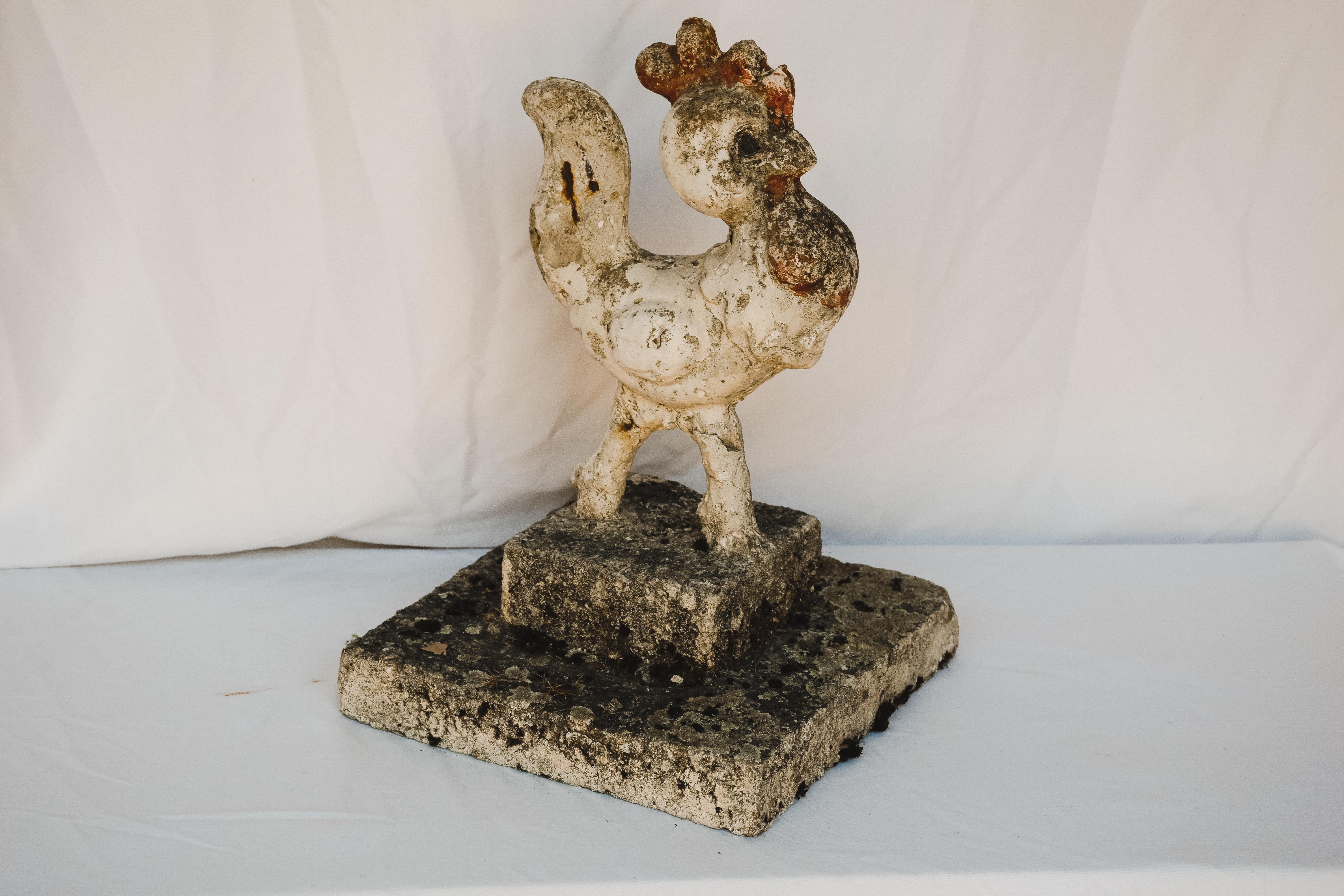 Mid-20th century concrete garden rooster. This garden element has an amazing time worn patina. Could be placed on a patio or in the garden. But honestly so incredible indoors. Great Conversations piece.