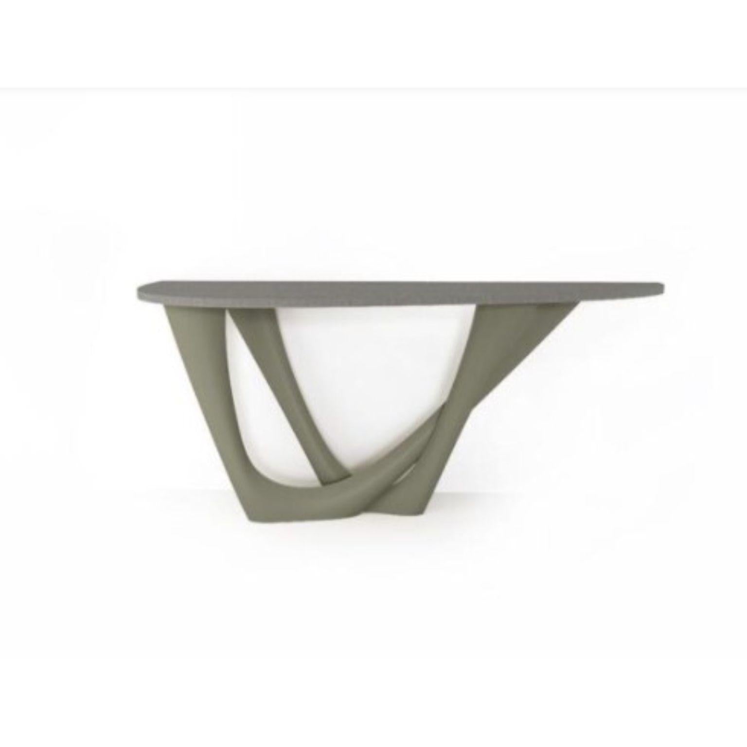 Concrete grey g-console duo concrete top and steel base by Zieta
Dimensions: D 56 x W 168 x H 75 cm 
Material: Carbon steel, concrete.
Also available in different colors and dimensions.

G-Console is another bionic object in our collection. Created