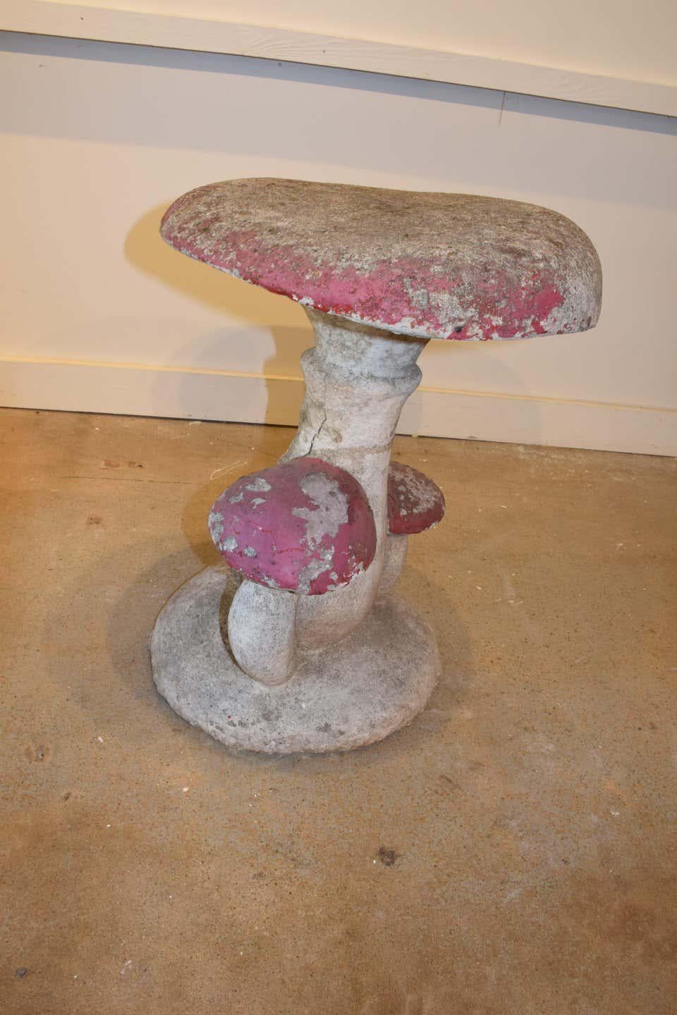 Found in France, this cement cluster of mushrooms serves well as a whimsical garden element. This strong sturdy piece could also be used as a unique end table or stool.


15