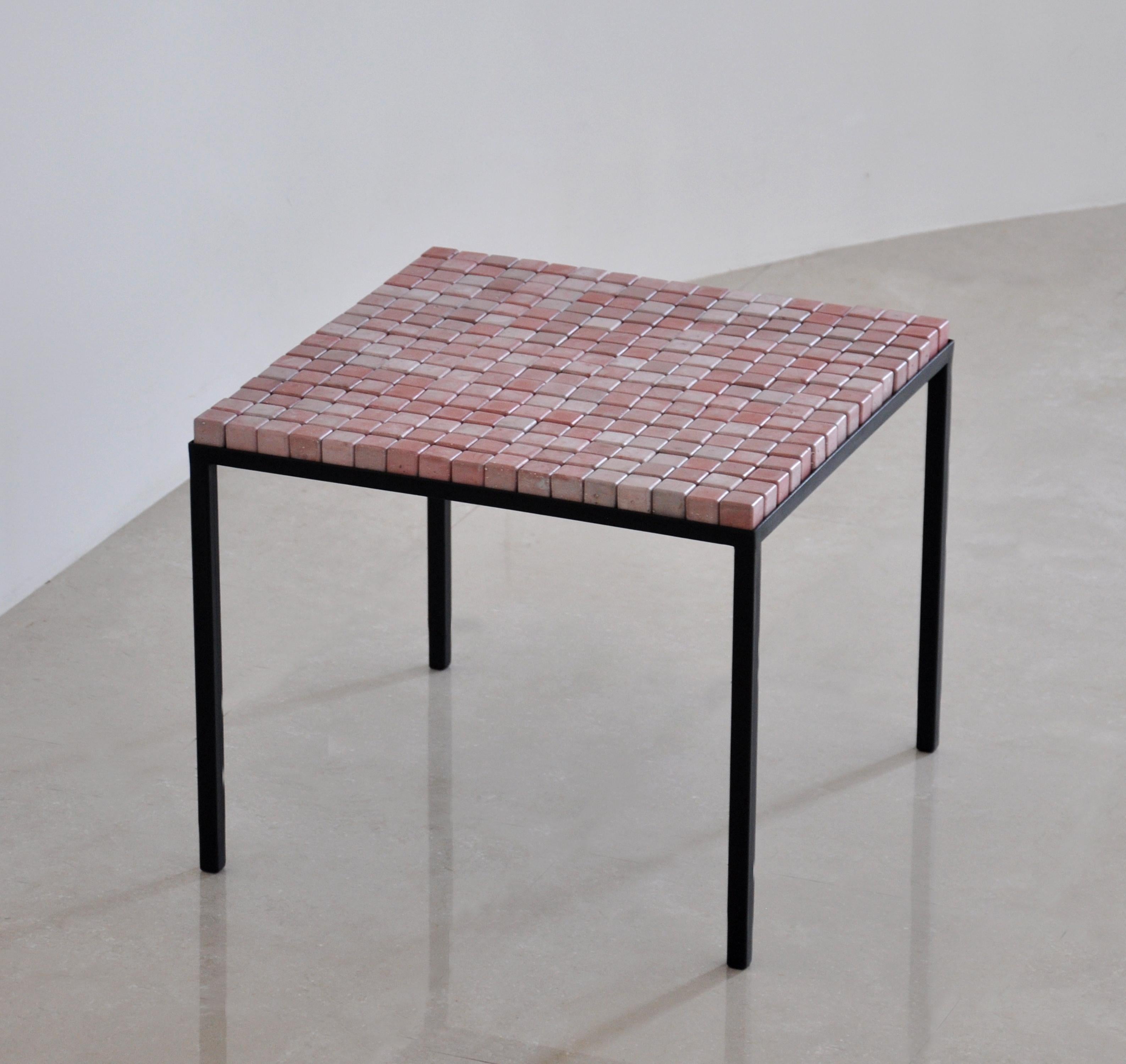Concrete red cube table by Miriam Loellmann
Edition of 10
Signed
Materials: colored concrete, steel (hand painted), leather
Dimensions: 56.5 x 56.5 x 56.5 cm
Weight: 22 kg.

Cubes are removable, each table-top is unique, one of a kind and