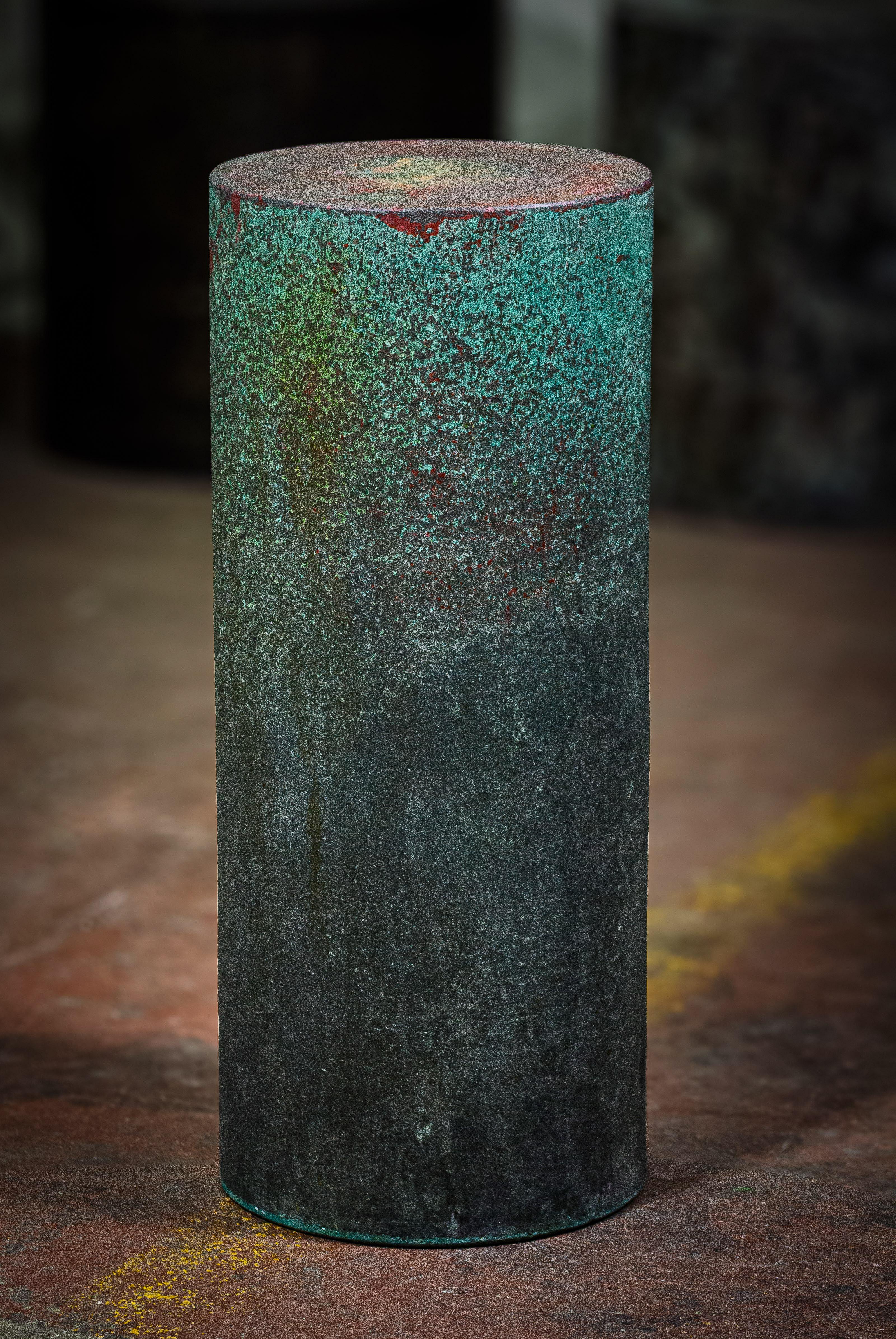 ‘Number 30’ from the Line Zero series is a striking fusion of sculptural form, refined craftsmanship, and raw material beauty. This tall cylindrical side table is hand-crafted from GFRC, a high-performance concrete known for its strength and