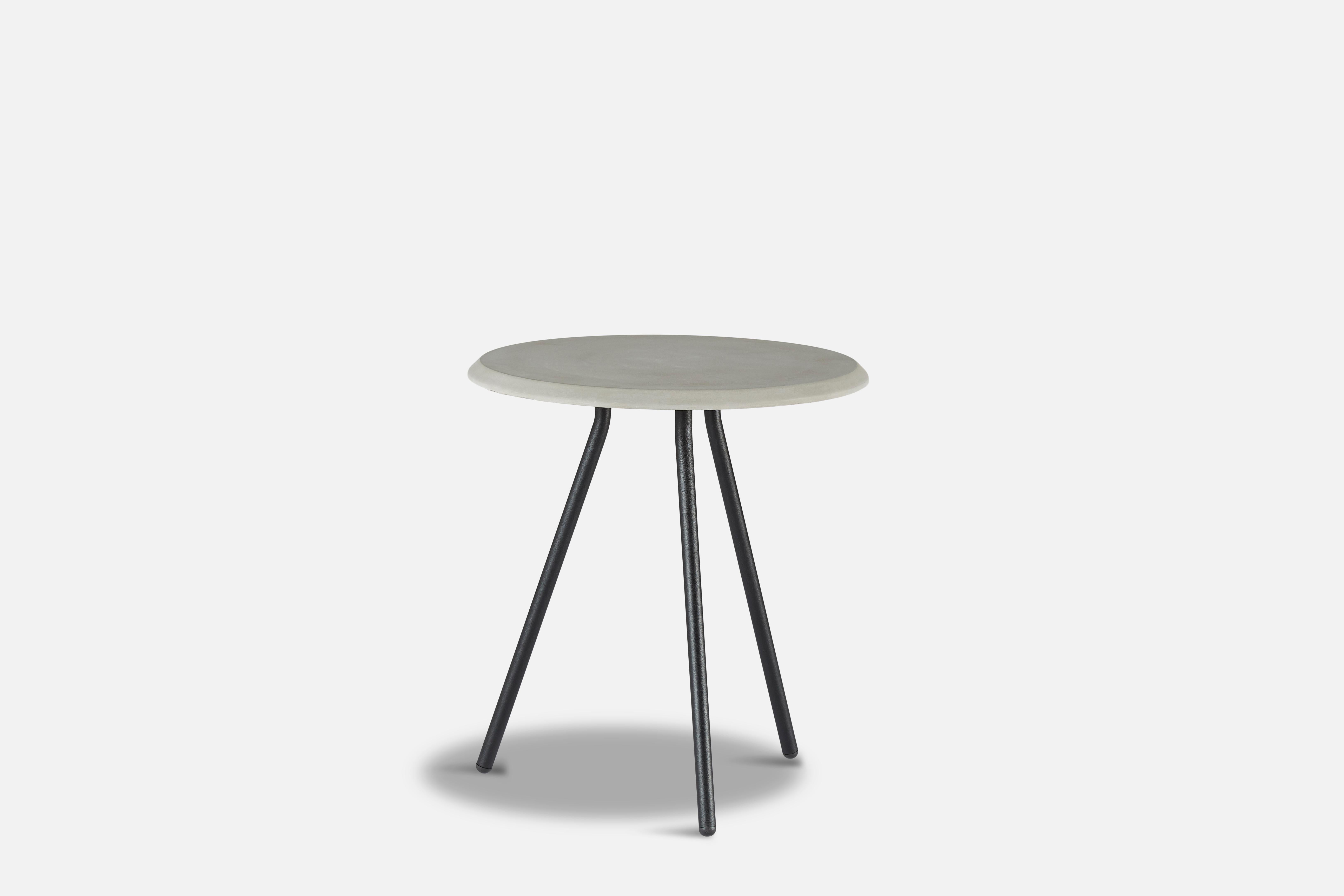 Concrete soround side table by Nur Design.
Materials: Metal, Fibre Concrete.
Dimensions: D 45 x W 45 x H 49 cm.
Also available in different sizes and materials: Nano Laminate, Ash, Fibre Concrete. 

The founders, Mia and Torben Koed, decided to