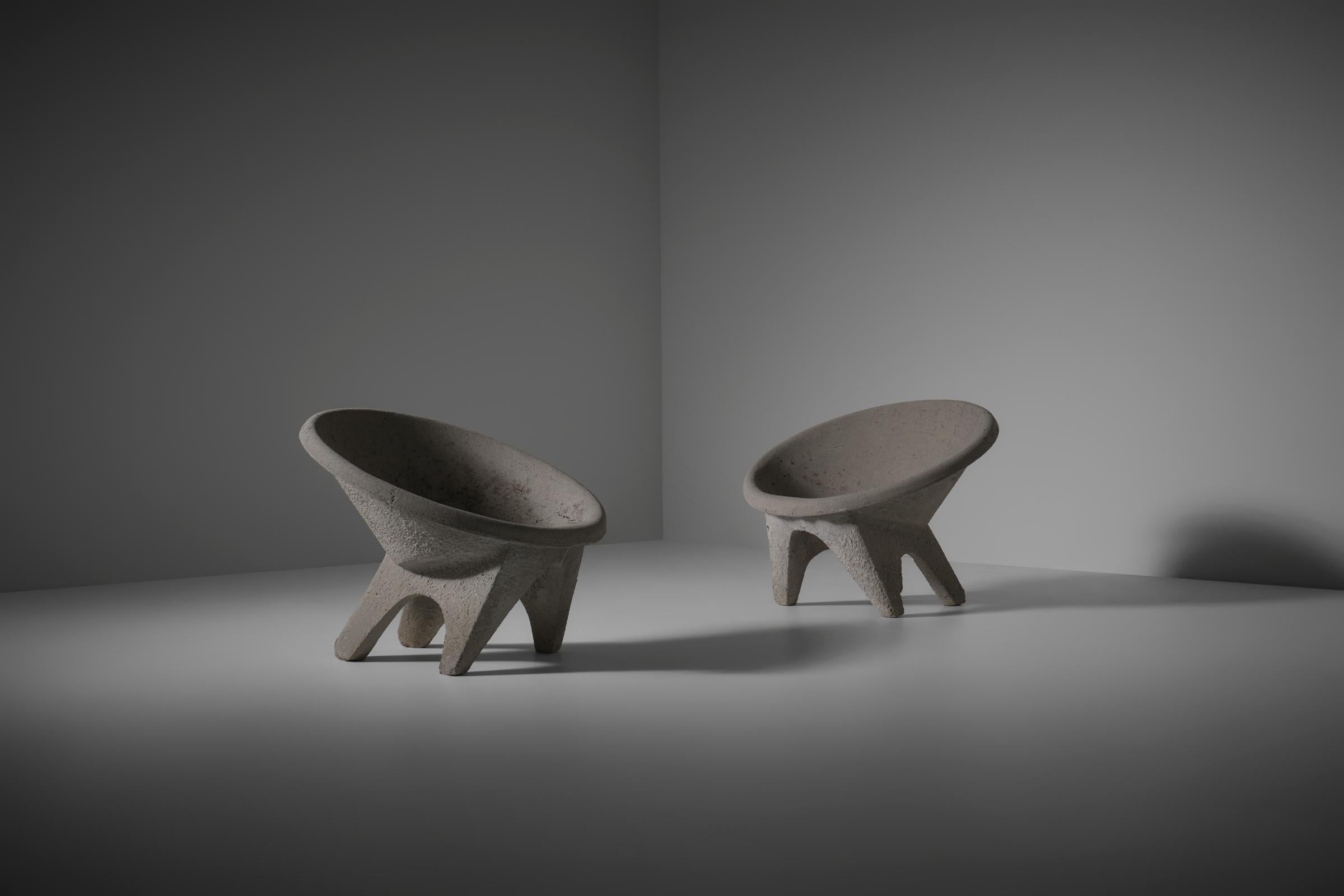 Sculptural concrete ‘sphere’ chairs, Italy - 1960’s. The chairs where produced by a company from Modena- Italy who where specialized in architectonic concrete outdoor objects and furniture. The chairs are made of solid weaponed concrete and have a