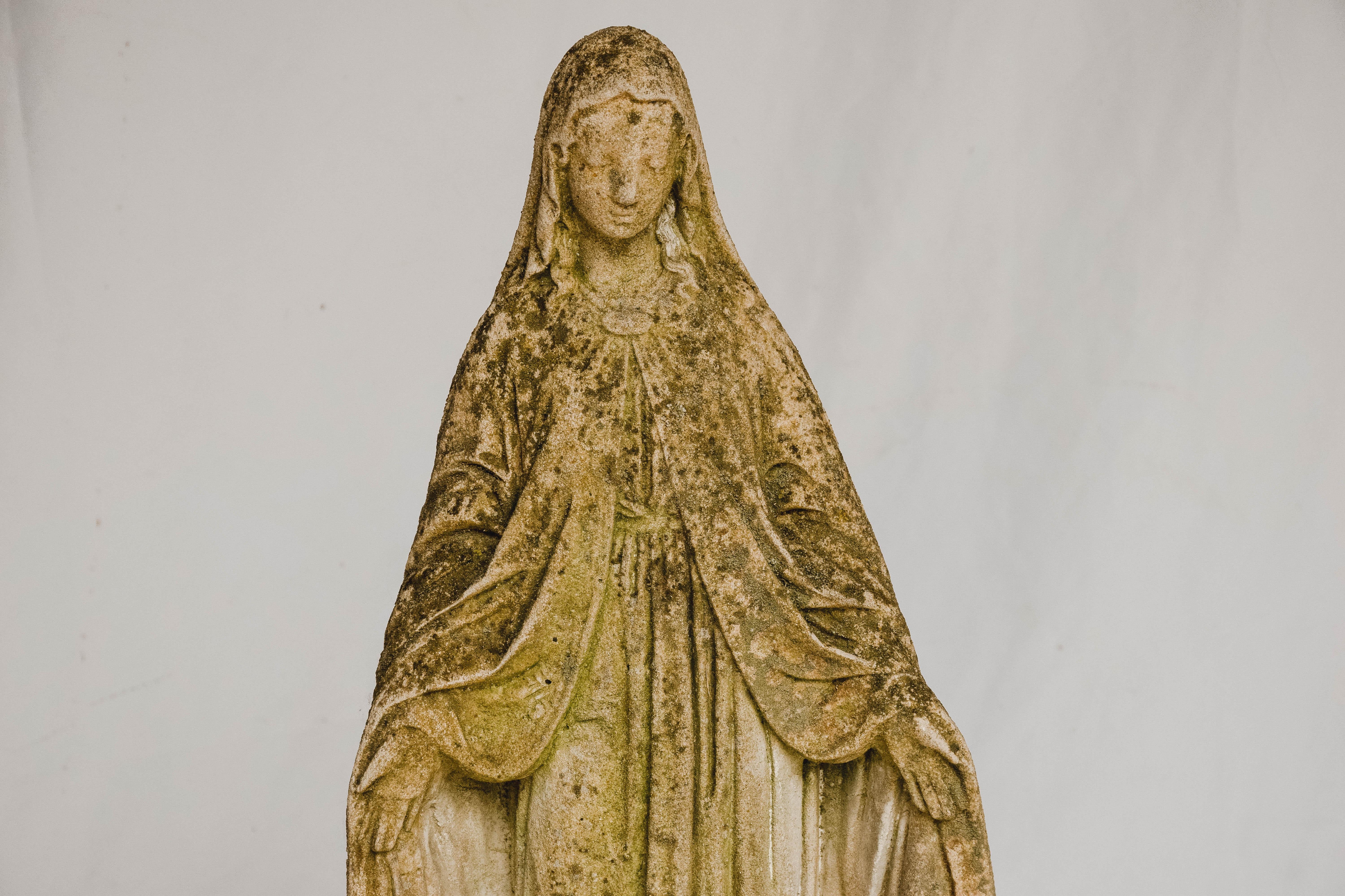 cement virgin mary statue
