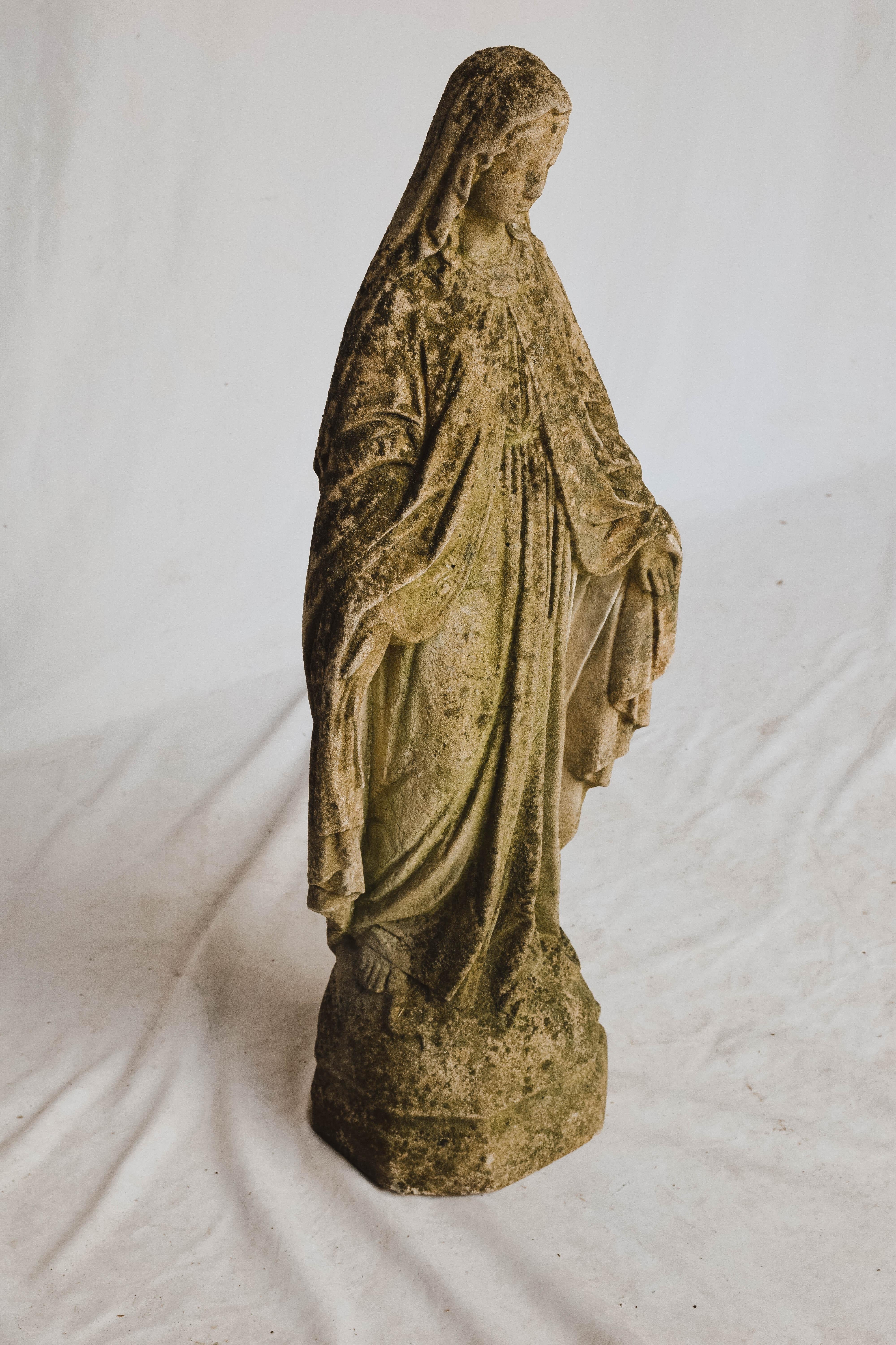 cement virgin mary statue