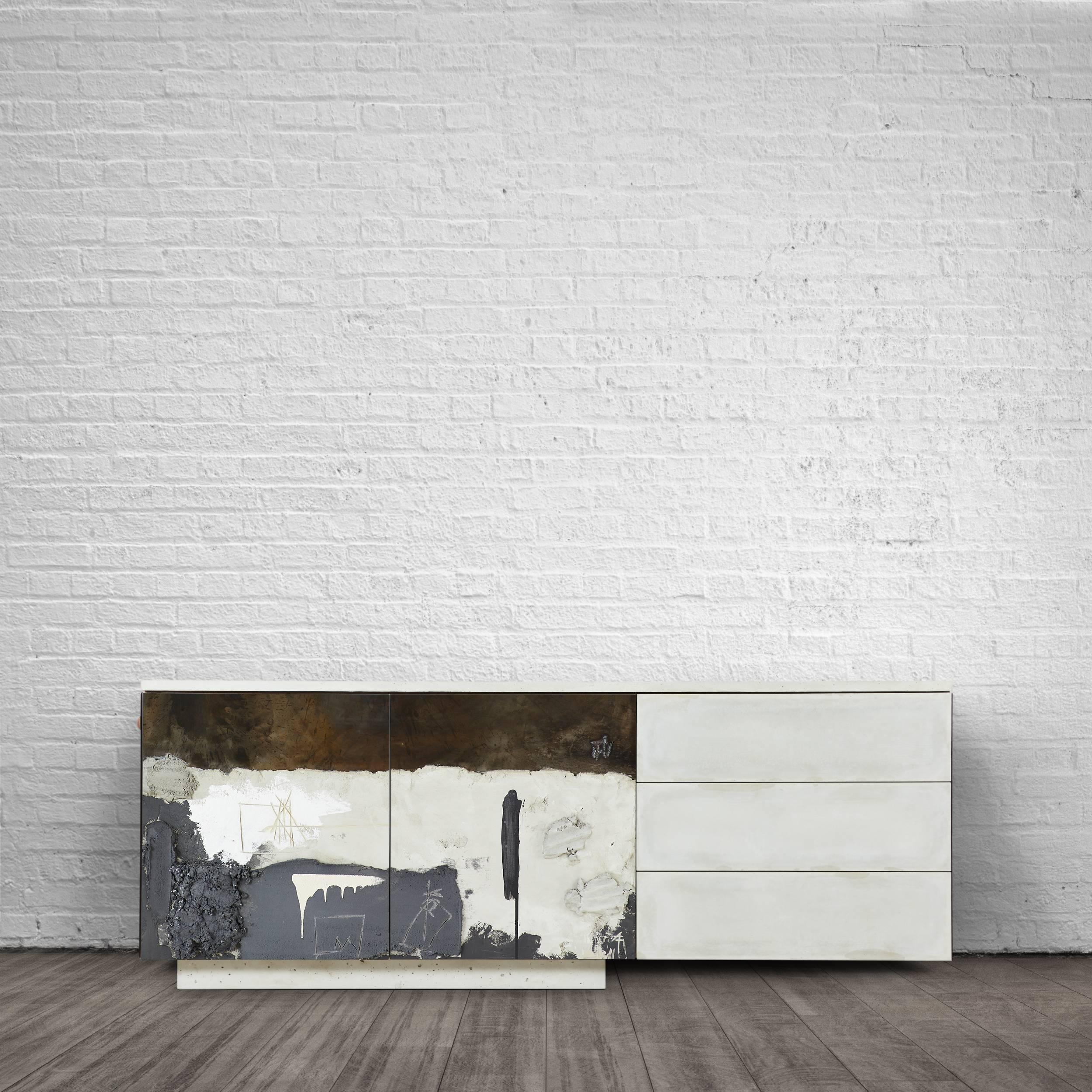 This credenza is a riff on the original C-210 credenza. The fascia is a mixed media application of concrete, steel and paint inspired by Stefan Rurak's art 