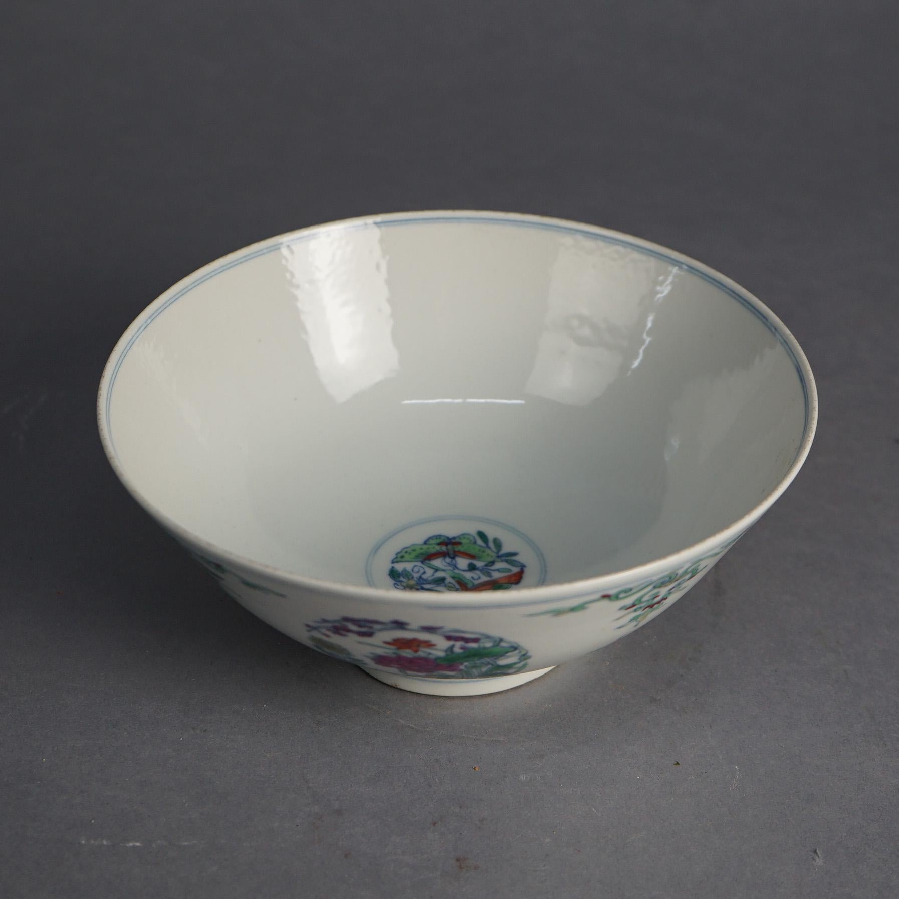 Chinese Doucai Floral Decorated Porcelain Bowl with Garden Flowers & Yongzheng Mark 20thC

Measures - 3 3/4