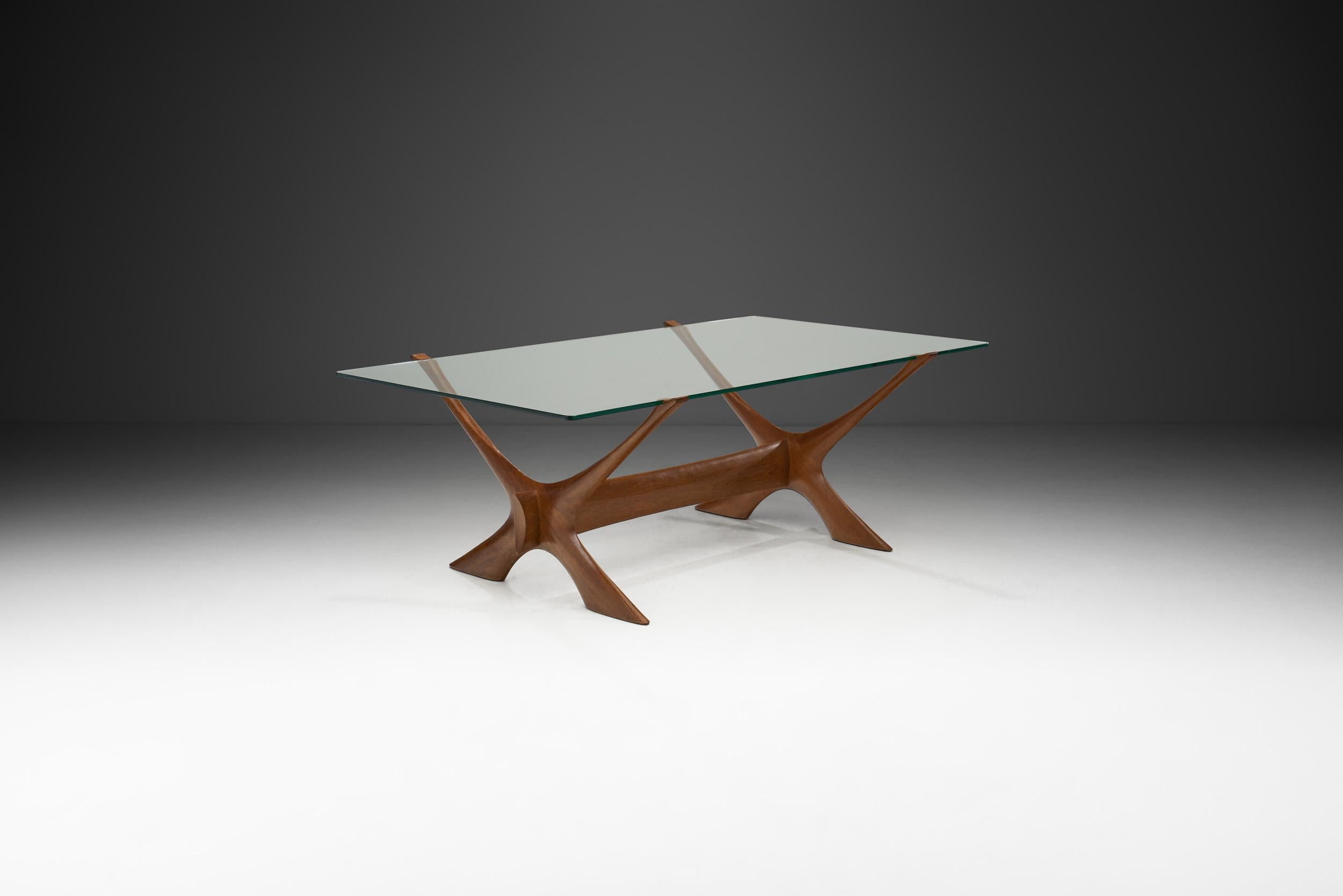 Swedish designer, Fredrik Schriever-Abeln’s designs have become quite sought after only in the past years. This is in part due to the beloved design of this “Condor” table being misattributed to Illum Wikkelsø until recently.

The distinctive “X”