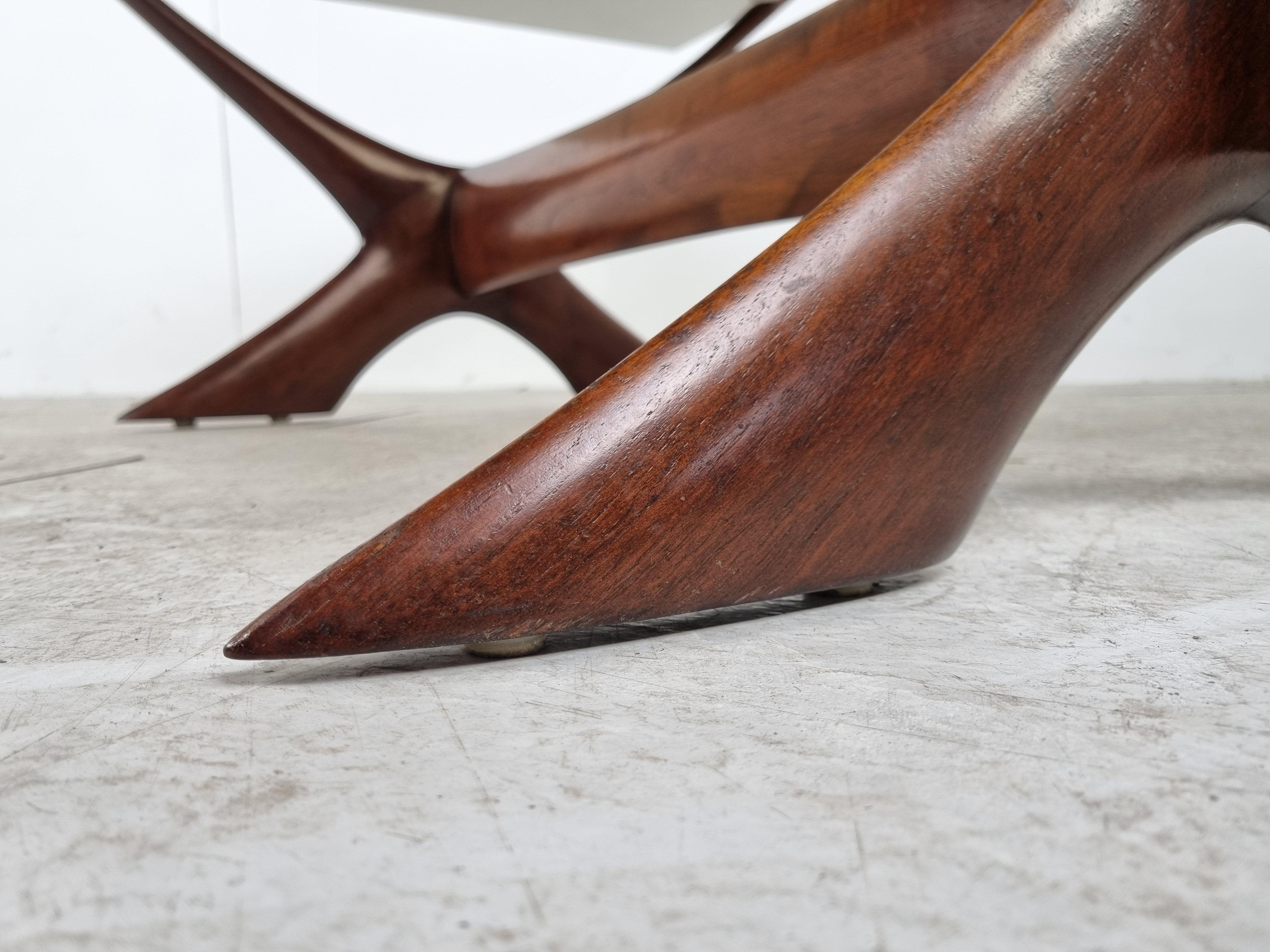 Spectacular mid century coffee table designed by Fredrik Schriever-Abeln for the swedish company Örebro Glasfabrik.

The table is beautiful to look at from every angle and features a beautifully made teak frame and smoked glass top.

1960s -