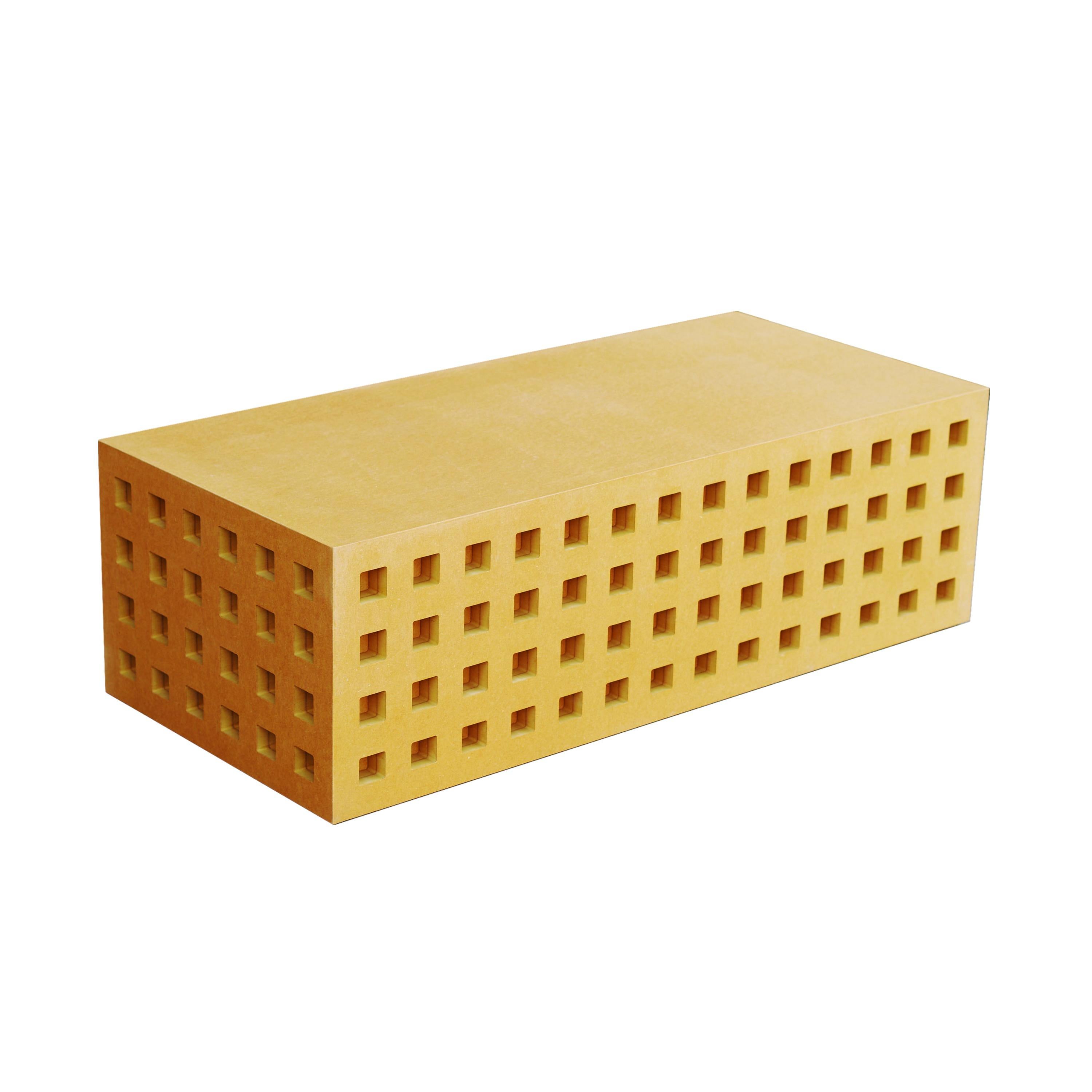 Condos Table is a coffee table inspired by Aldo Rossi and Brutalist apartment blocks, made of organically dyed wood fibreboard with a cement appearance. 
Material: Yellow Valchromat (shown) with MDF structure.