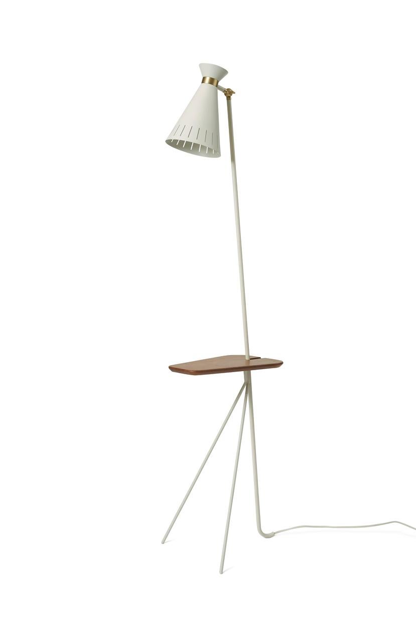 Cone Floor Lamp with Table Warm White by Warm Nordic
Dimensions: D28 x W33 x H144 cm
Material: Lacquered steel, Solid brass
Weight: 3 kg
Also available in different colours. Please contact us.

A classic floor lamp with a small, integrated, solid