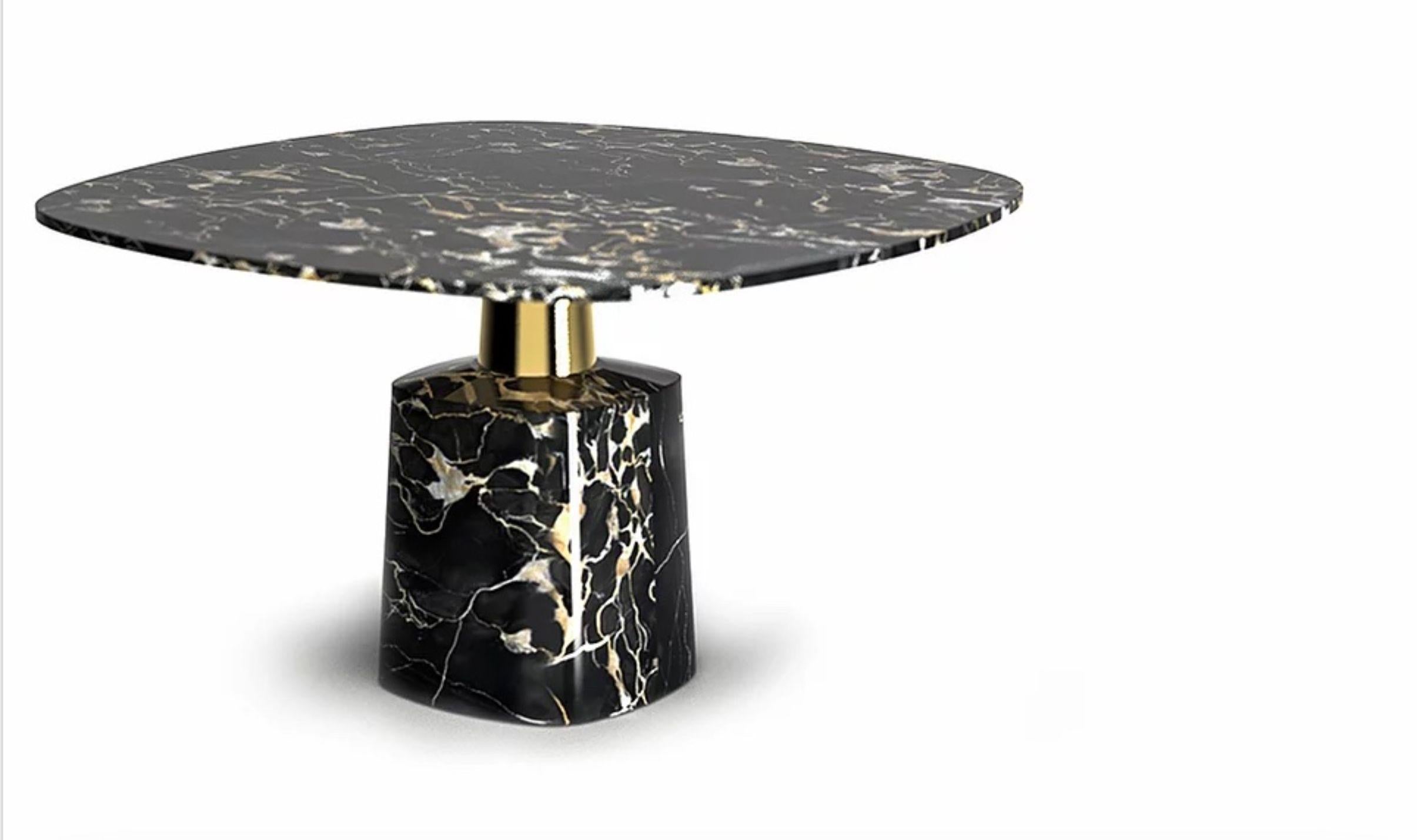 Cone marble dining table by Marmi Serafini
Materials: Marble and brass
Dimensions: 140 x 140 H80 cm

Elegant table defined by a clean and sophisticated lines stronlgy characterized by a metal leg that at the same time divides and still unify the