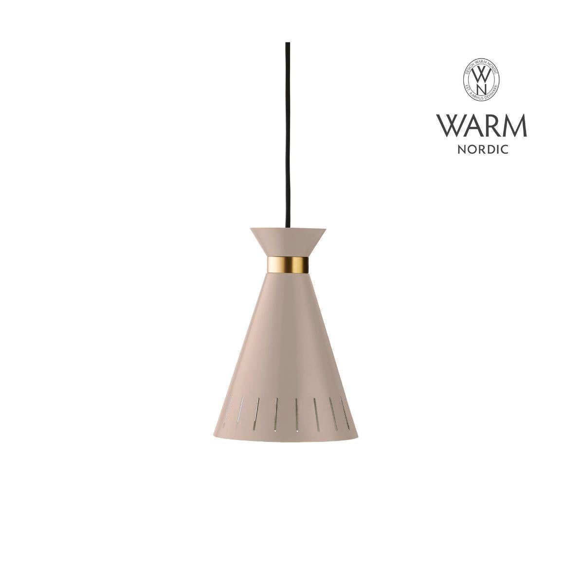 A Classic pendant with charm, finesse and an elegant, solid brass ring, designed in the 1950s by the internationally renowned lighting designer, Svend Aage Holm-Sørensen. The rigorous expression means that the cone pendant can hang beautifully alone