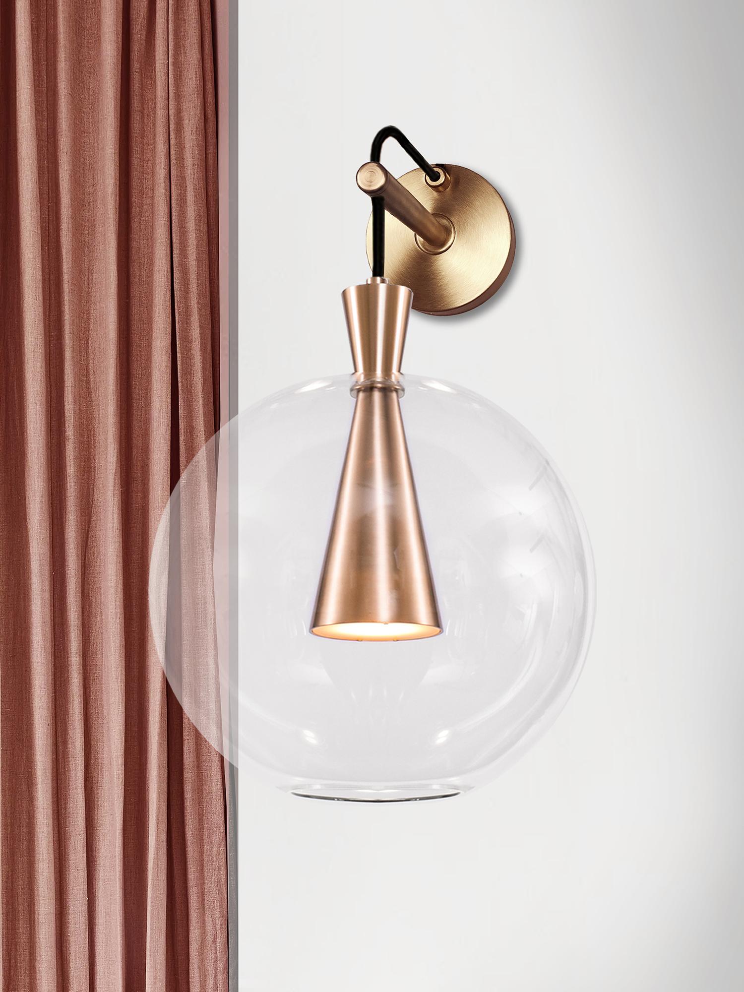 Cone is designed to showcase the beauty and timeless elegance of geometrical symmetry. Each cone is machined from a solid block of brass.

GU10 LED Bulb.