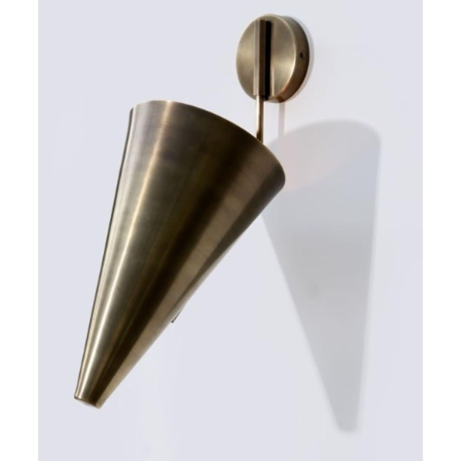 Cone Wall Sconce Two by Lamp Shaper
Dimensions: D 19 x W 30.5 x H 31 cm.
Materials: Brass.

Different finishes available: raw brass, aged brass, burnt brass and brushed brass Please contact us.

All our lamps can be wired according to each country.