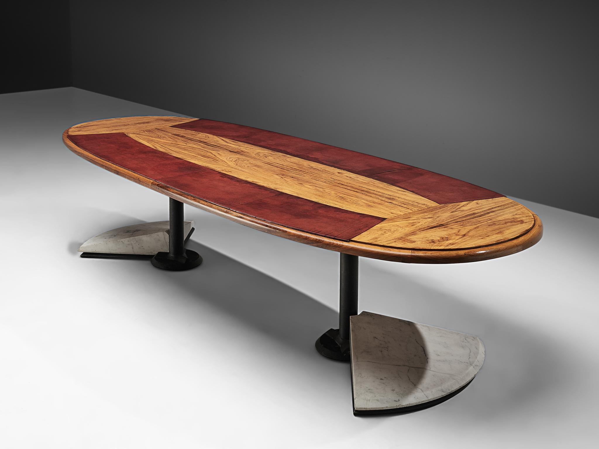 Conference table, Carrara marble, walnut, iron, Italy, 1970s. 

This captivating oval table from Italy serves as an ideal choice for either a conference or a dining setting. It achieves a harmonious whole despite its diverse materials. The
