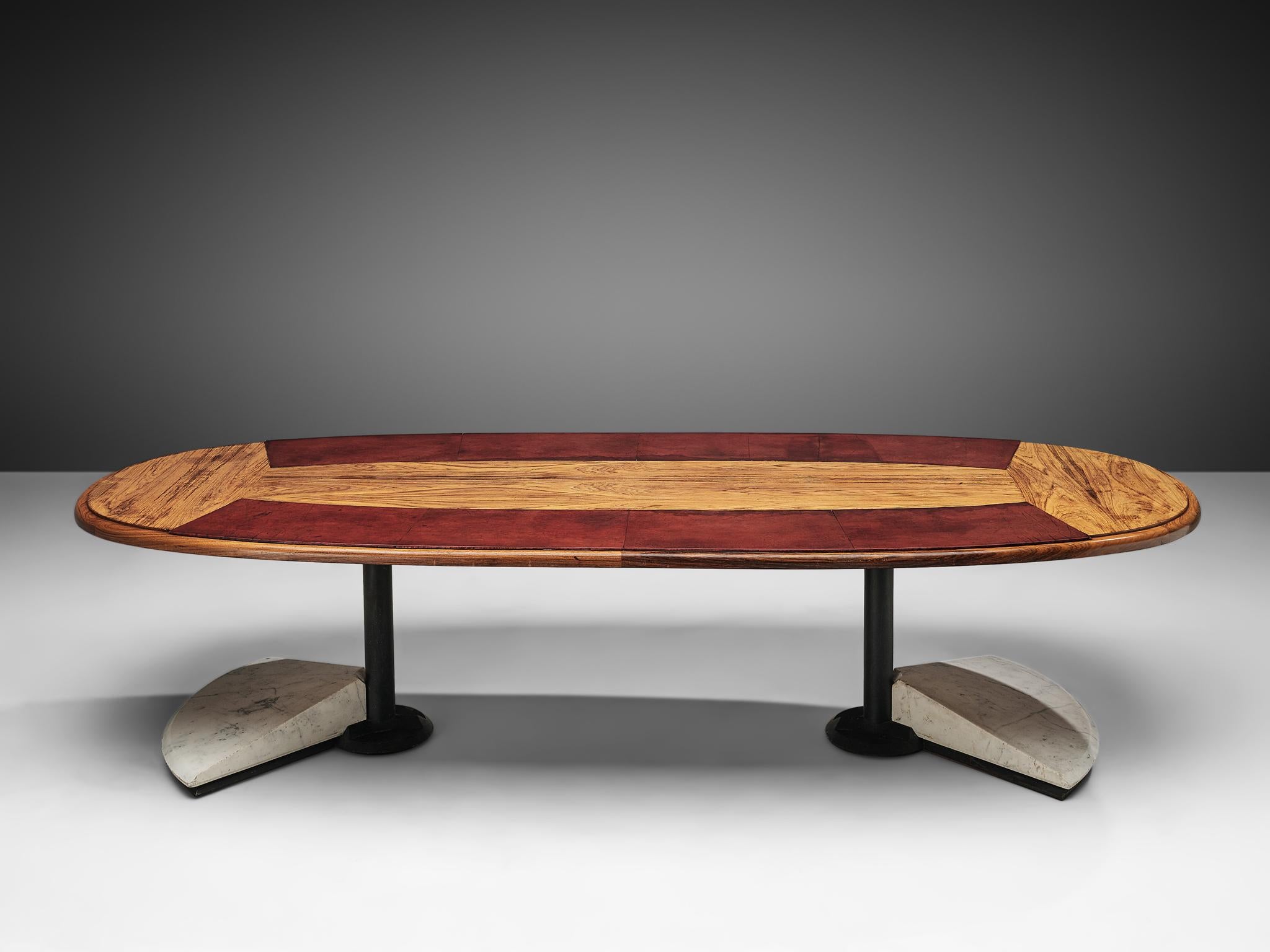 Conference table, marble, walnut, metal, Italy, 1970s. 

Striking oval table that can be used as conference table or large dining table. Despite being made out of different materials, a beautiful balance is formed. The metal frame and marble base