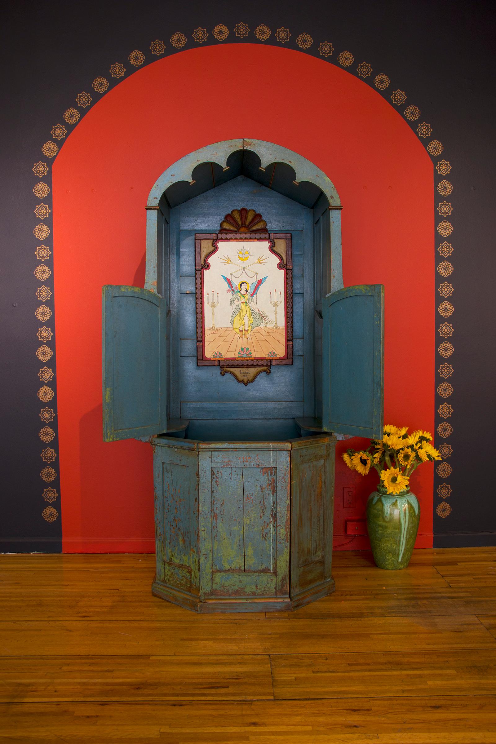 Unique confessional, likely from Northern Mexico, created in the late 19th century to the early 20th century (1880-1920). This catholic confession stall was hand made from pine.  Excellent patina from multiple layers of blue/green paint.  The screen