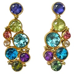 Borchie con costellazione di coriandoli in oro 14K