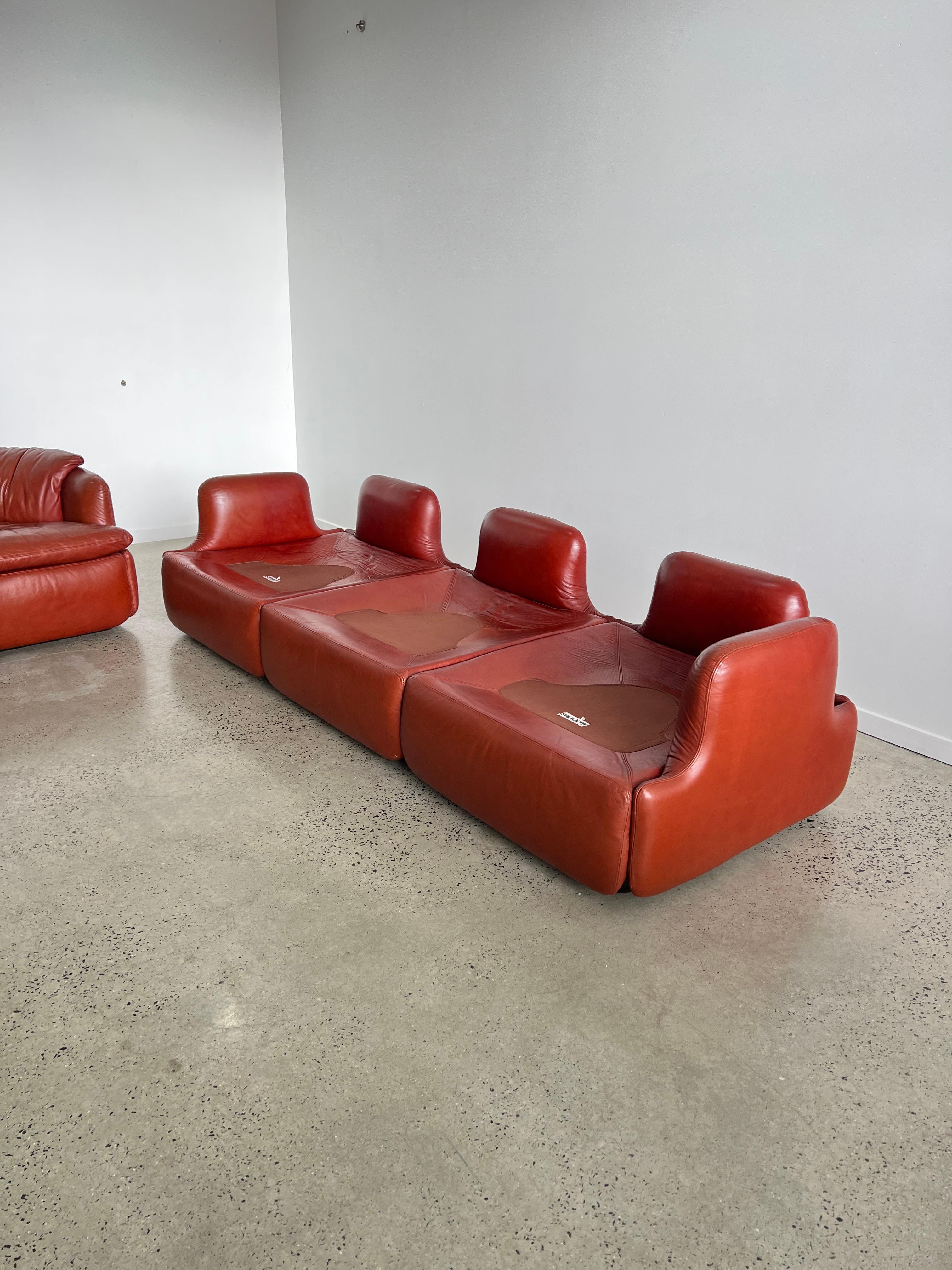 Rare full set of two armchairs and a three seater sofa by Alberto Rosselli for Saporiti.
The 