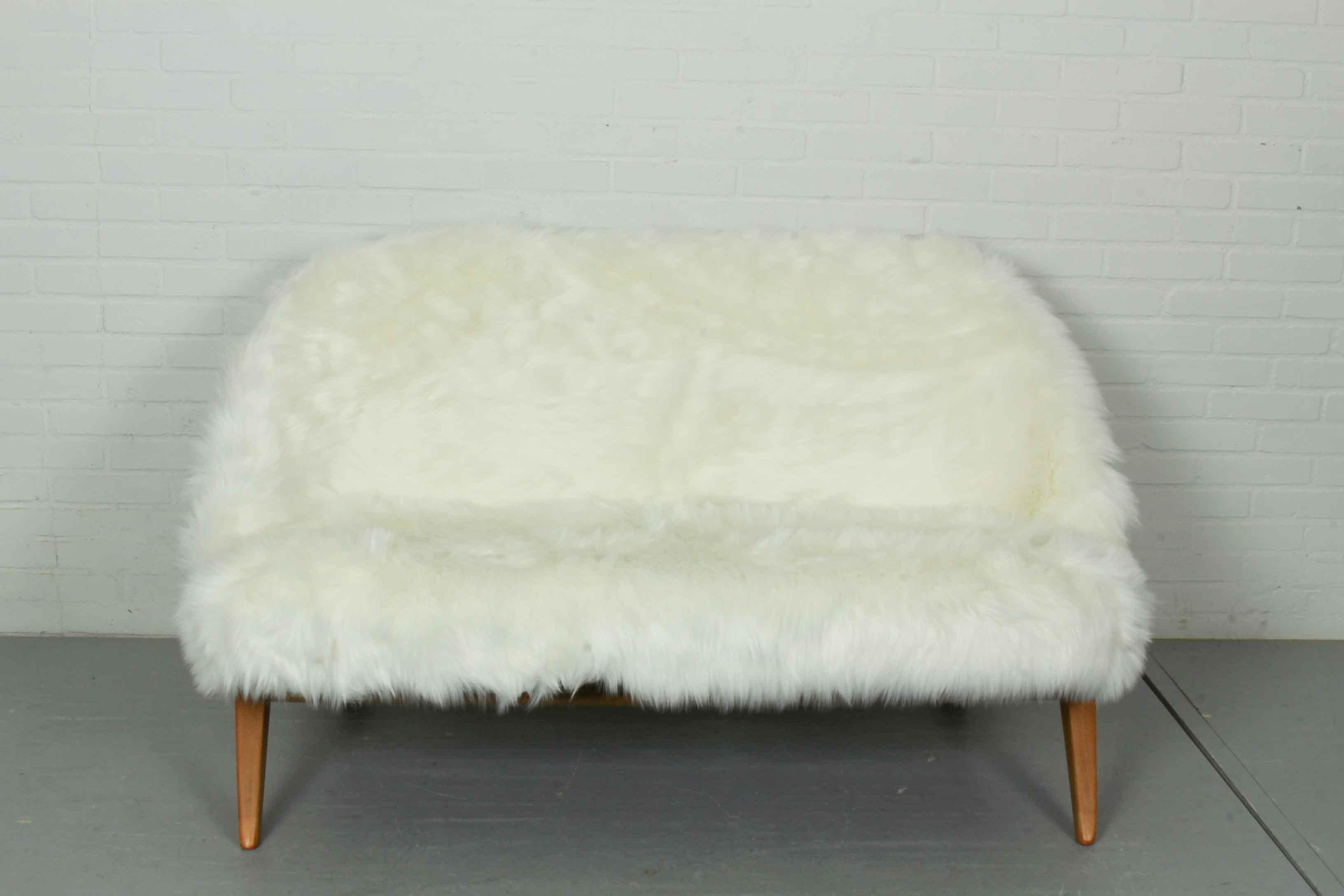 Sofa 'Congo' by Theo Ruth for Artifort, newly upholstered with Luxury Siberian long pile faux fur upholstery fabric The Netherlands, 1950s This Congo sofa is by Theo Ruth for Artifort. The back and the seat are seperate pieces that fit together in a