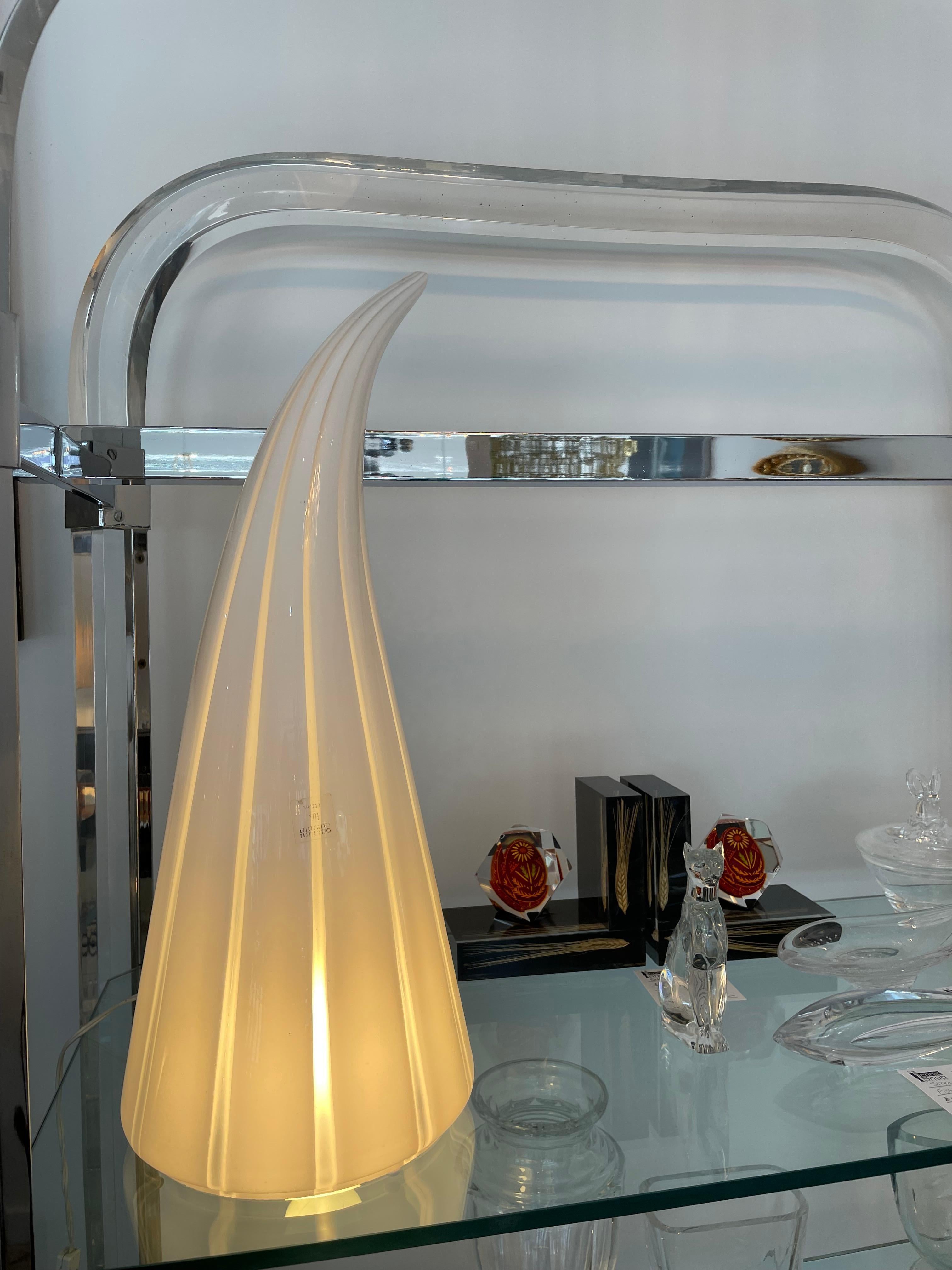 This stylish, hip and chic Murano glass table lamp dates to the 1970s and was created by the Vetri workroom.  The piece is a combinationof light gray/white and white glass, hand blown into a conical form.

Note: Requires on Edison based light