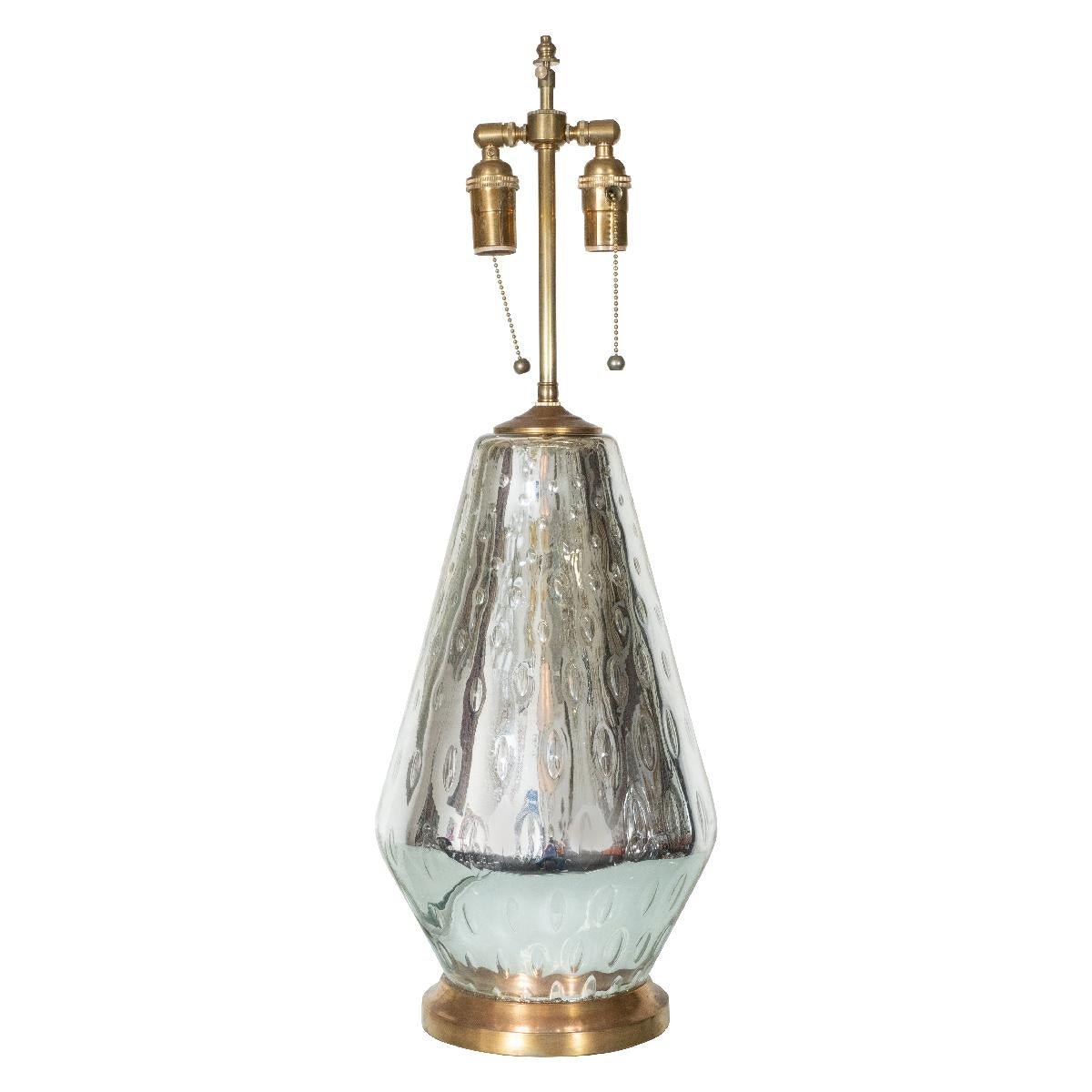 Single conical mercury glass table lamp with bubble design and brass hardware.